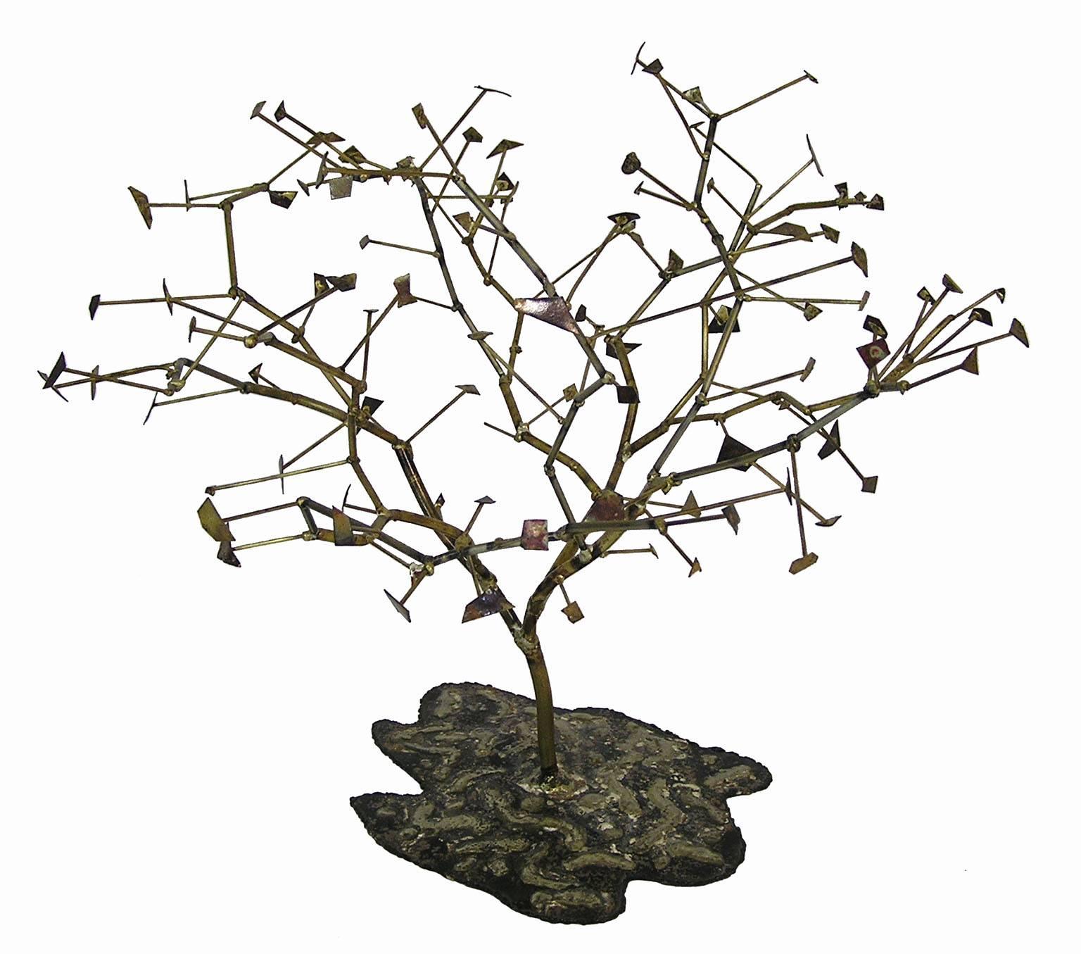 A very unique metal art sculpture designed in the style of famous artist Curtis Jere. This could be used as a piece of decorative art or as a creative option to display jewelry in a home or retail setting. Overall condition is excellent with very