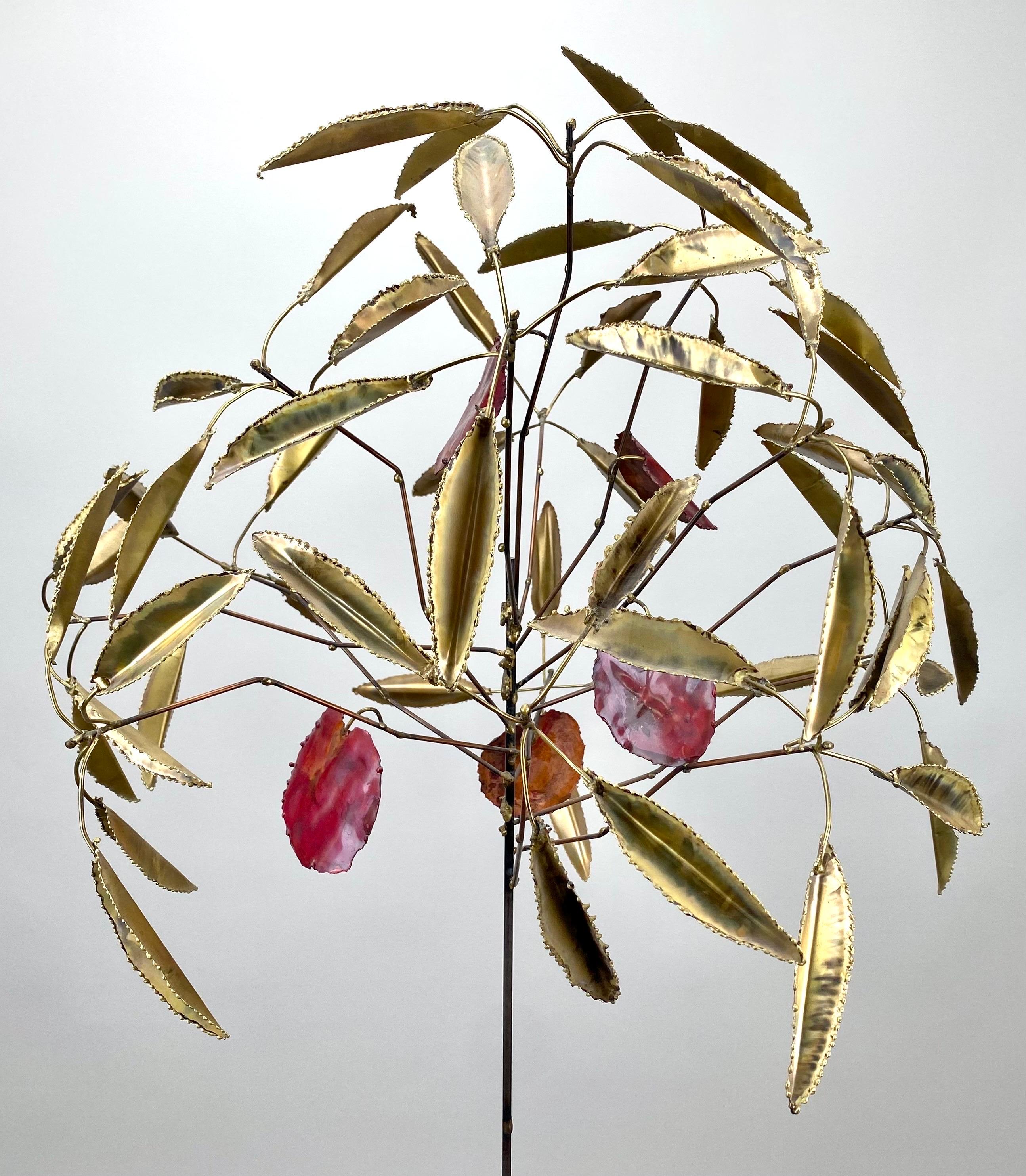 An exquisite Mid-century Brutalist Copper and Brass Tree Sculpture—a captivating masterpiece that seamlessly blends artistry and nature-inspired elegance. This remarkable piece is a celebration of craftsmanship and design, embodying the essence of