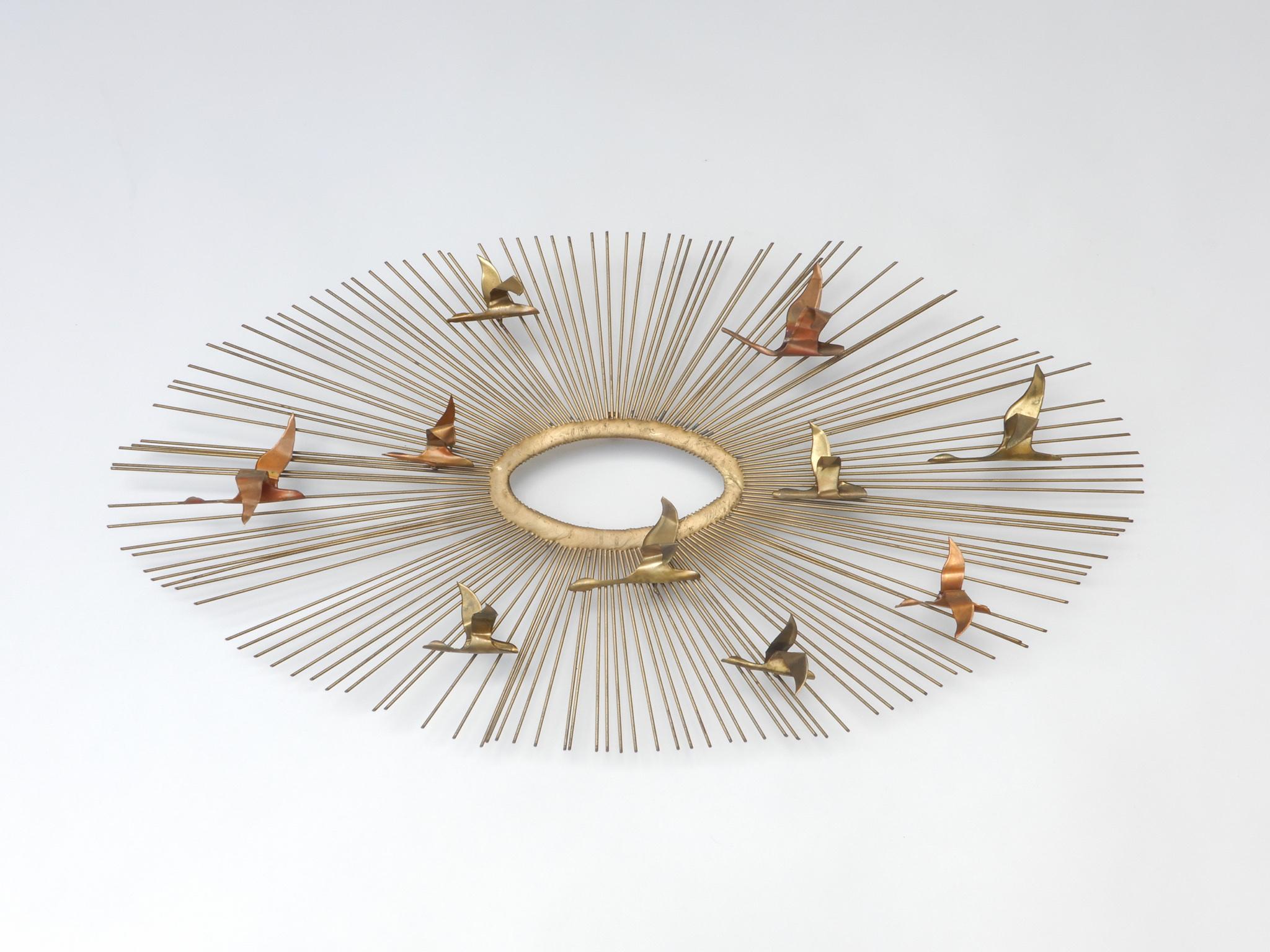 Curtis Jere metal wall hanging sunburst sculpture of birds, 1960s.