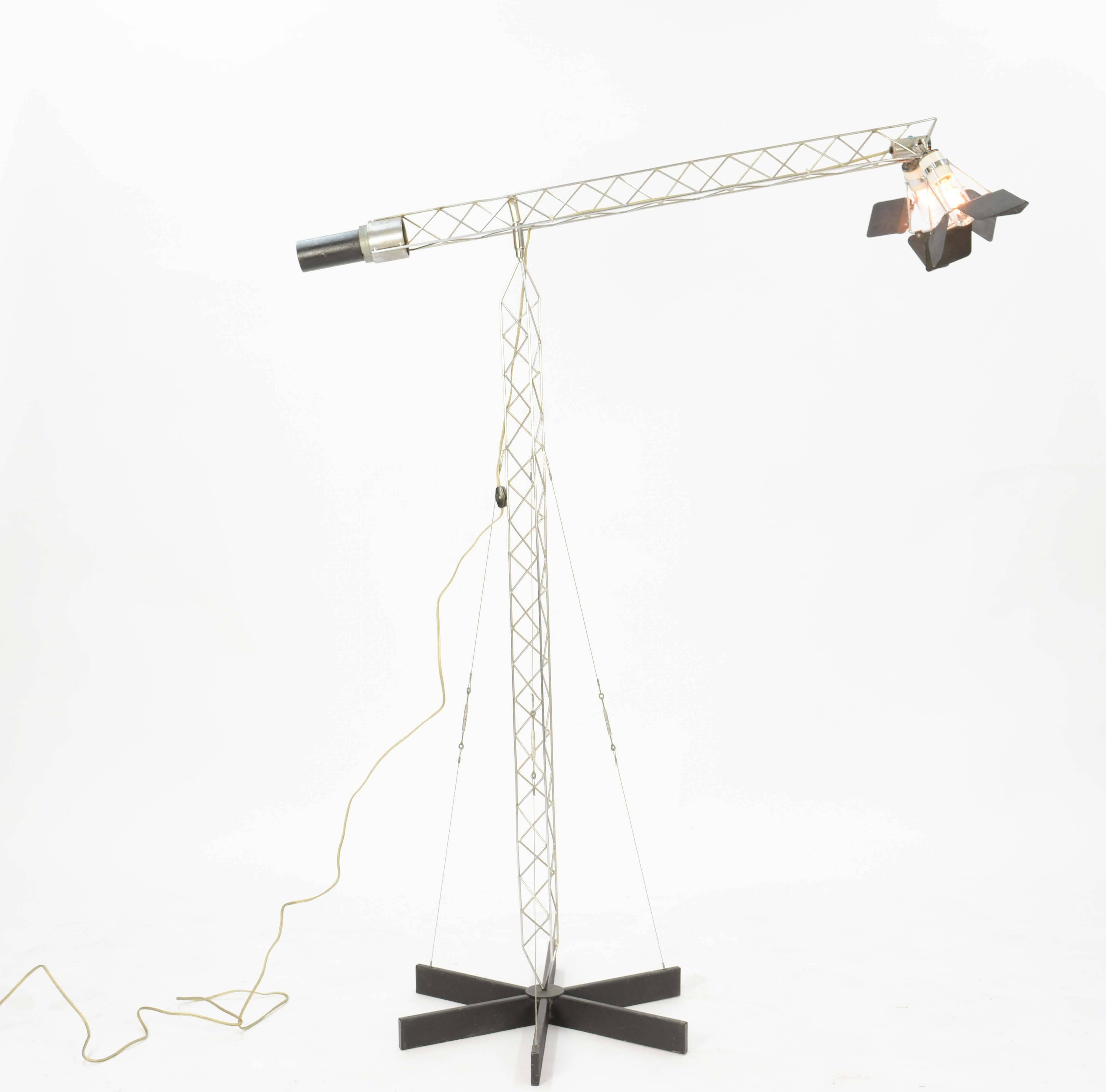 'Crane' floor lamp by Curtis Jere, 1977. The metal craft work in this playful lamp is stunning! The moving flaps around each bulb, to the finely constructed crane-like stem and arm, to the taught wires holding it to the base, this lamp is a marvel