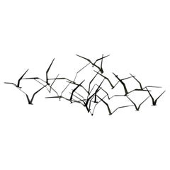 La scultura murale Birds in Flight di Curtis Jere