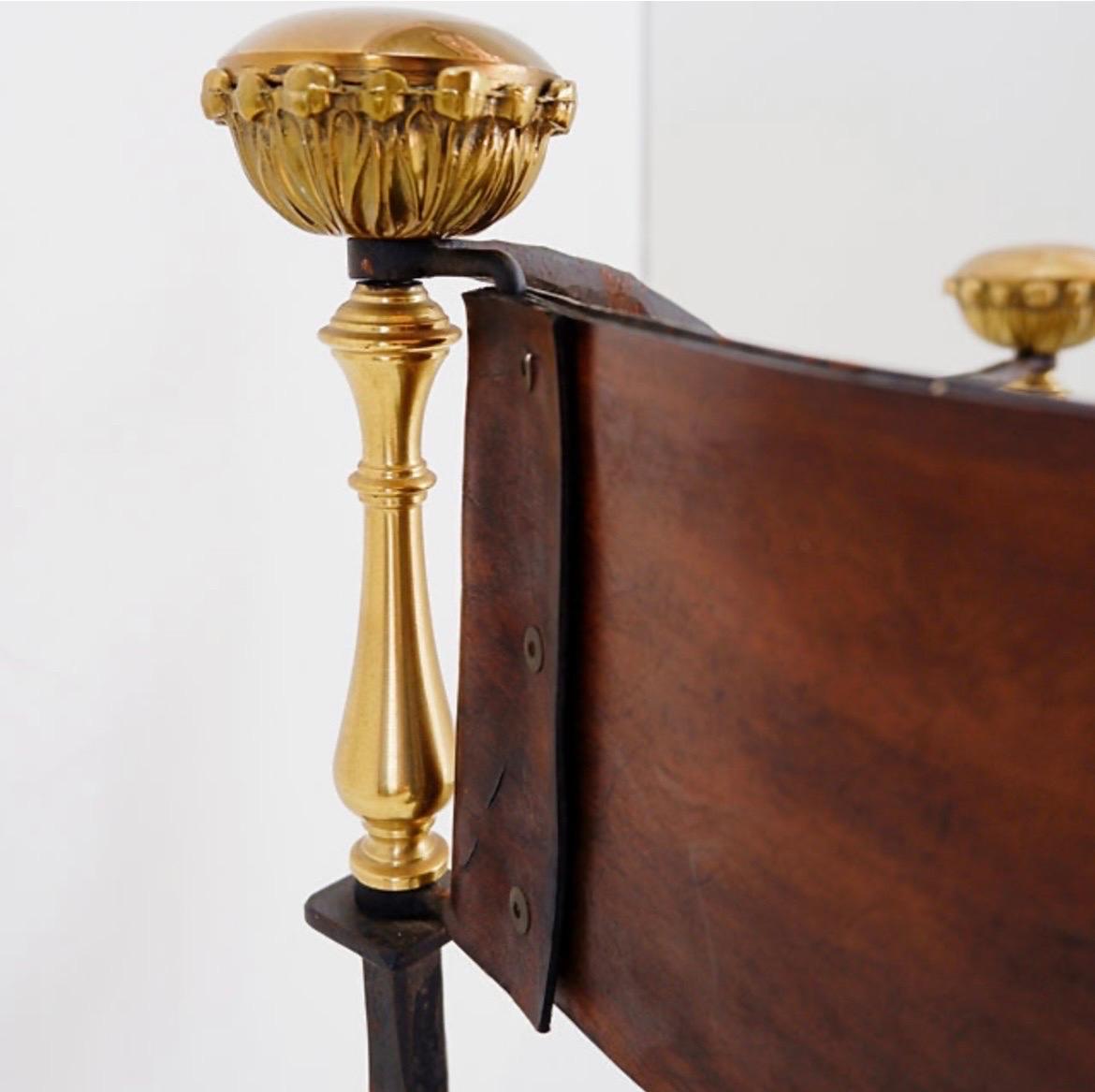 Curule armchair in wrought iron and leather

Wear Consistent with age and use

Antique - Decoration - 20th
Measures : 60x47cm H:78cm SH:40cm 
Materials : Leather - Iron - Brass 