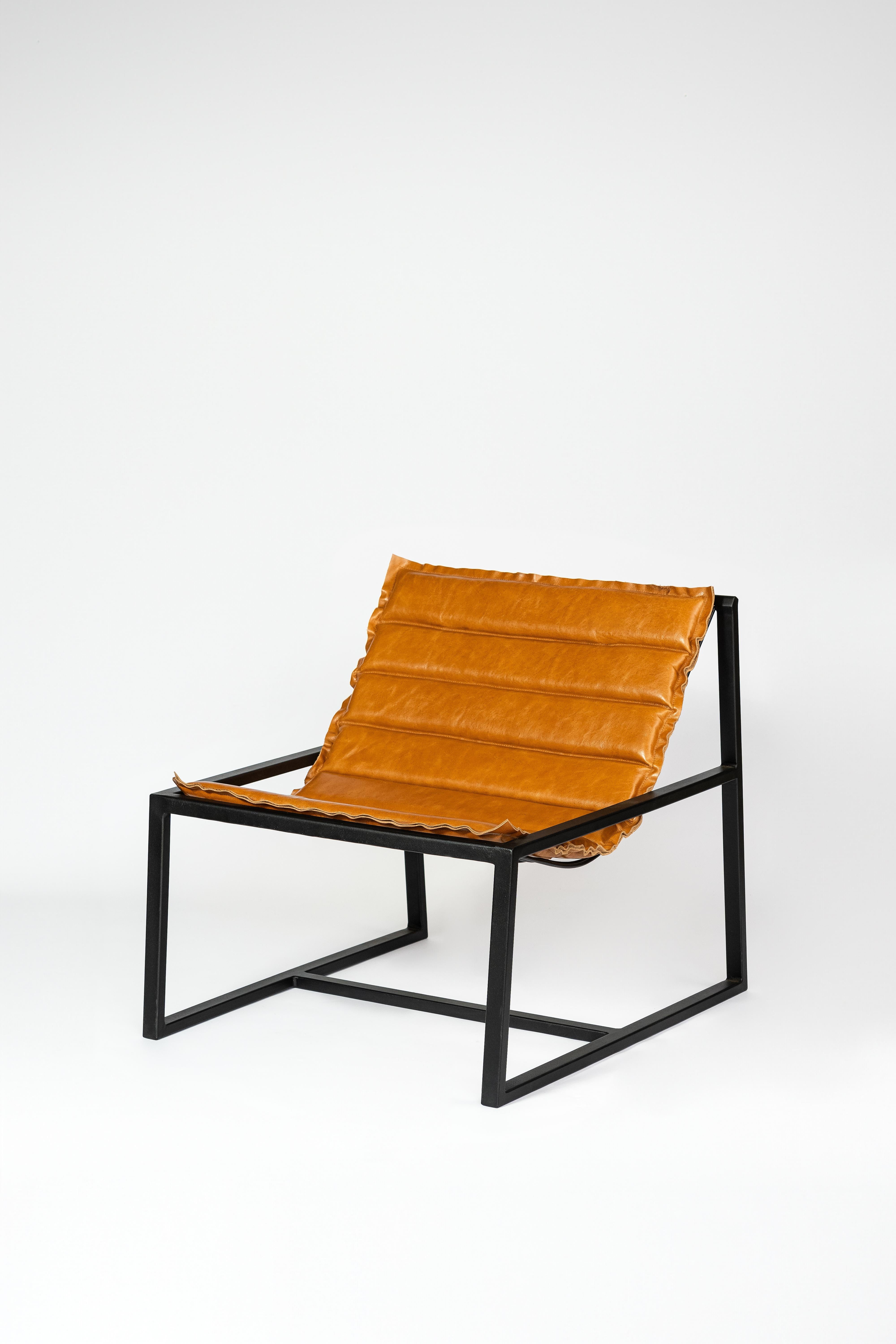 Sillón Curva de Estúdio Few con Asientos de Piel Industrial en venta