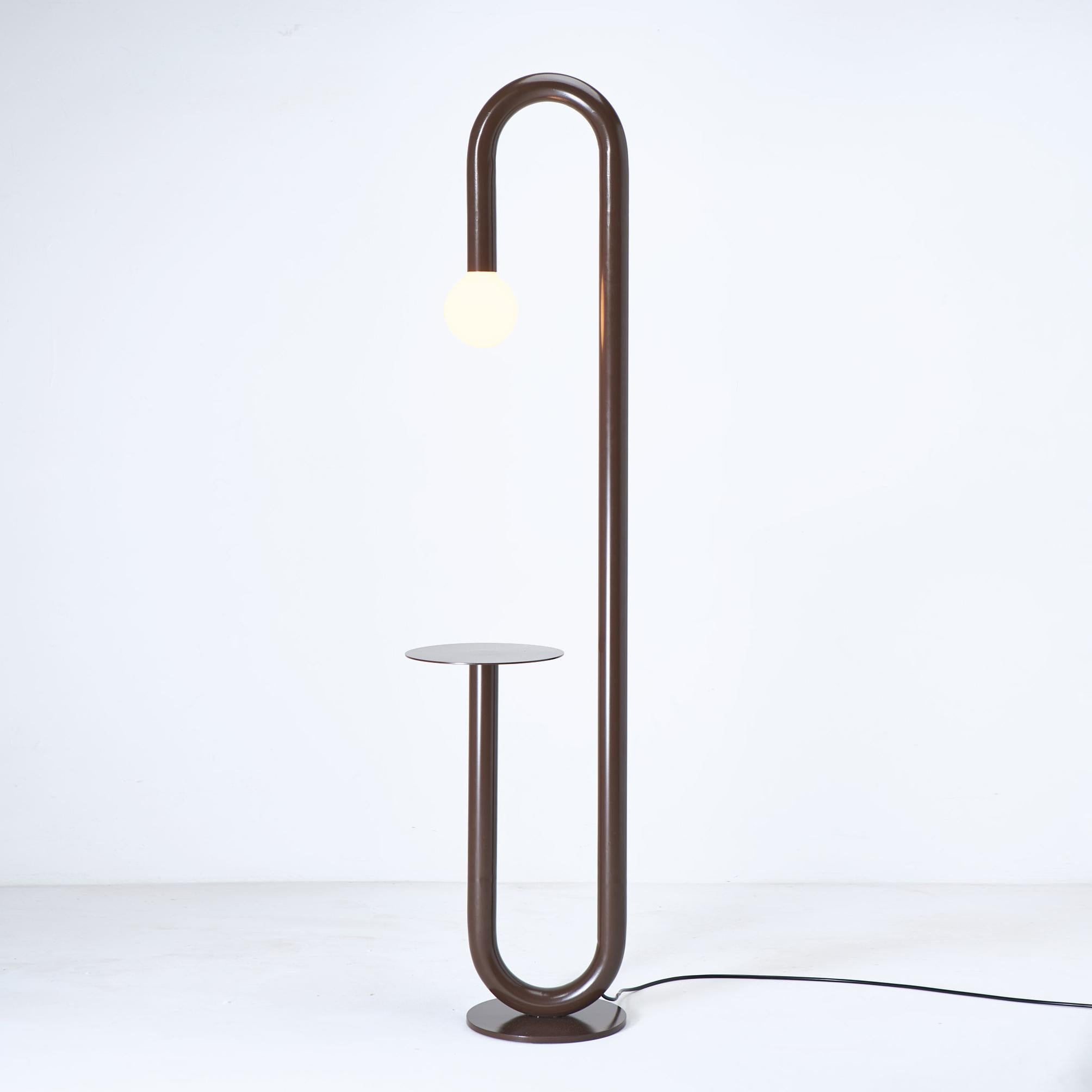 Curva floor lamp by Cultivado Em Casa
Dimensions: 27 x 38 x 160 cm 
Materials: Steel

A common item in steel houses, the 180º curve is the starting point for the development of the collection. Using this element of industrial origin and organic