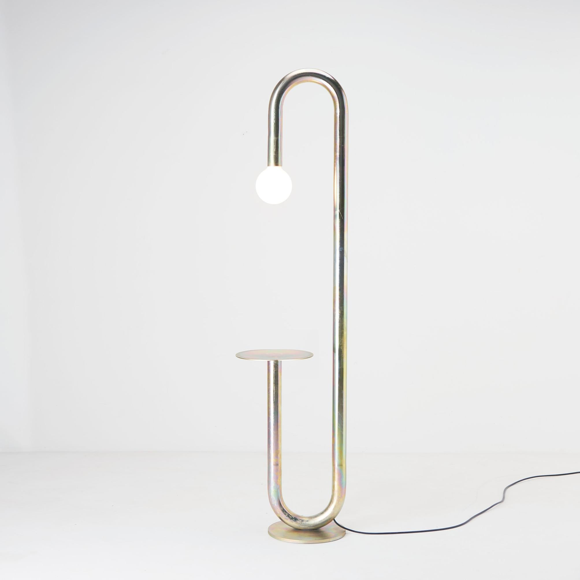 Curva Zincada floor lamp by Cultivado Em Casa
Dimensions: 27 x 38 x 160 cm 
Materials: Zinc

A common item in steel houses, the 180º curve is the starting point for the development of the collection. Using this element of industrial origin and