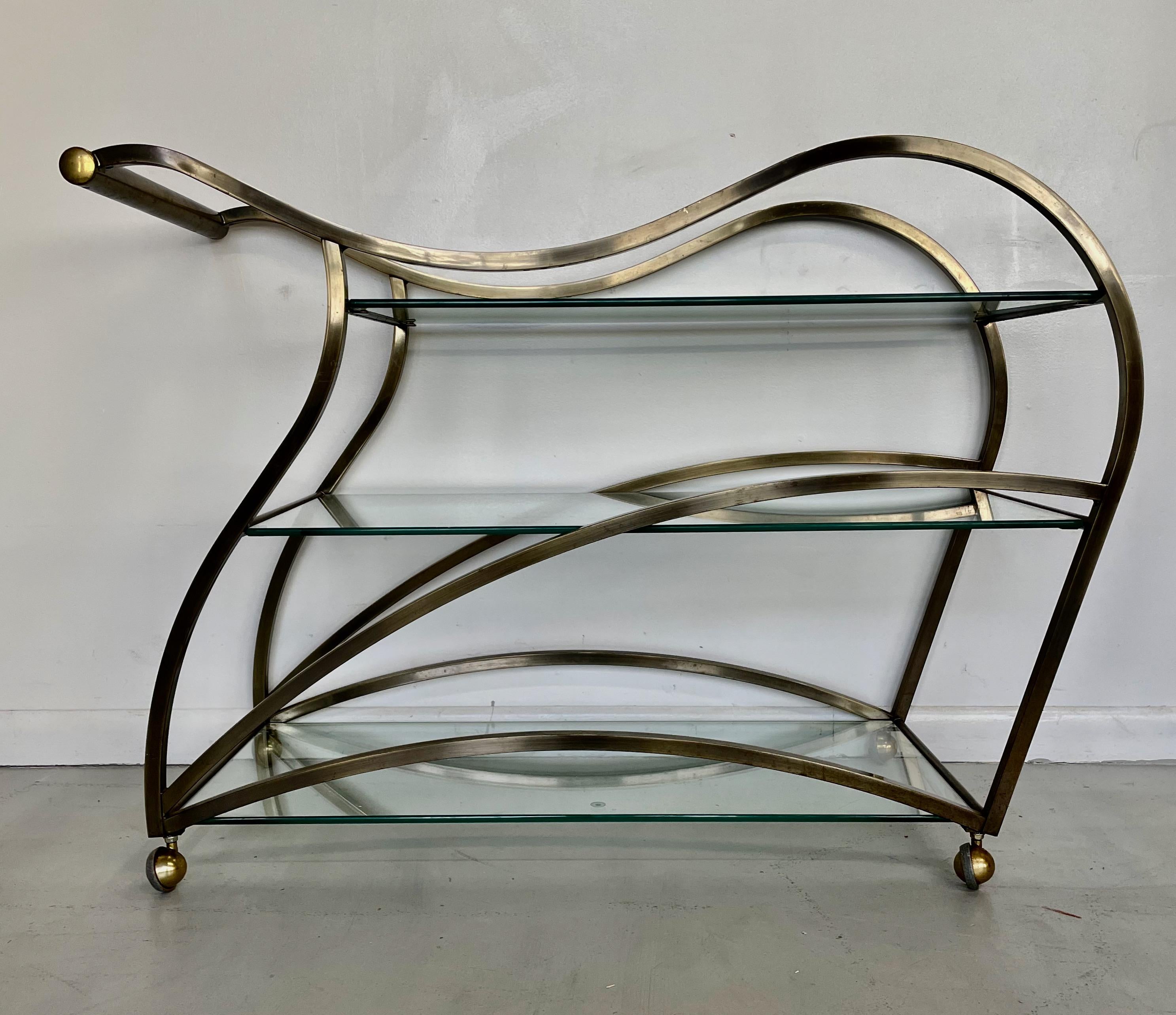 North American Curvaceous Bar Cart in Brass by Design Institute of America  For Sale