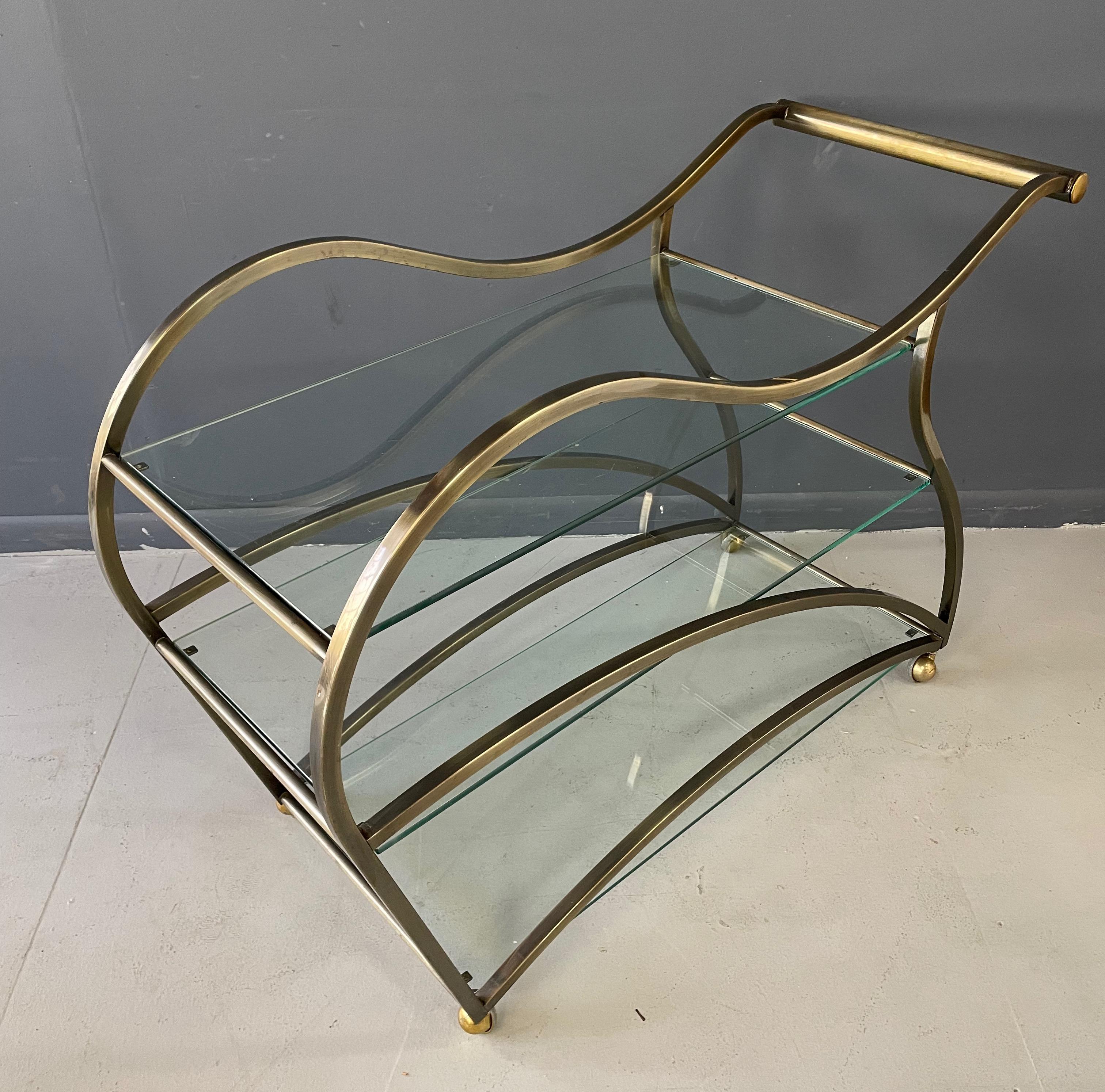 Curvaceous Bar Cart in Brass by Design Institute of America  In Good Condition For Sale In Philadelphia, PA
