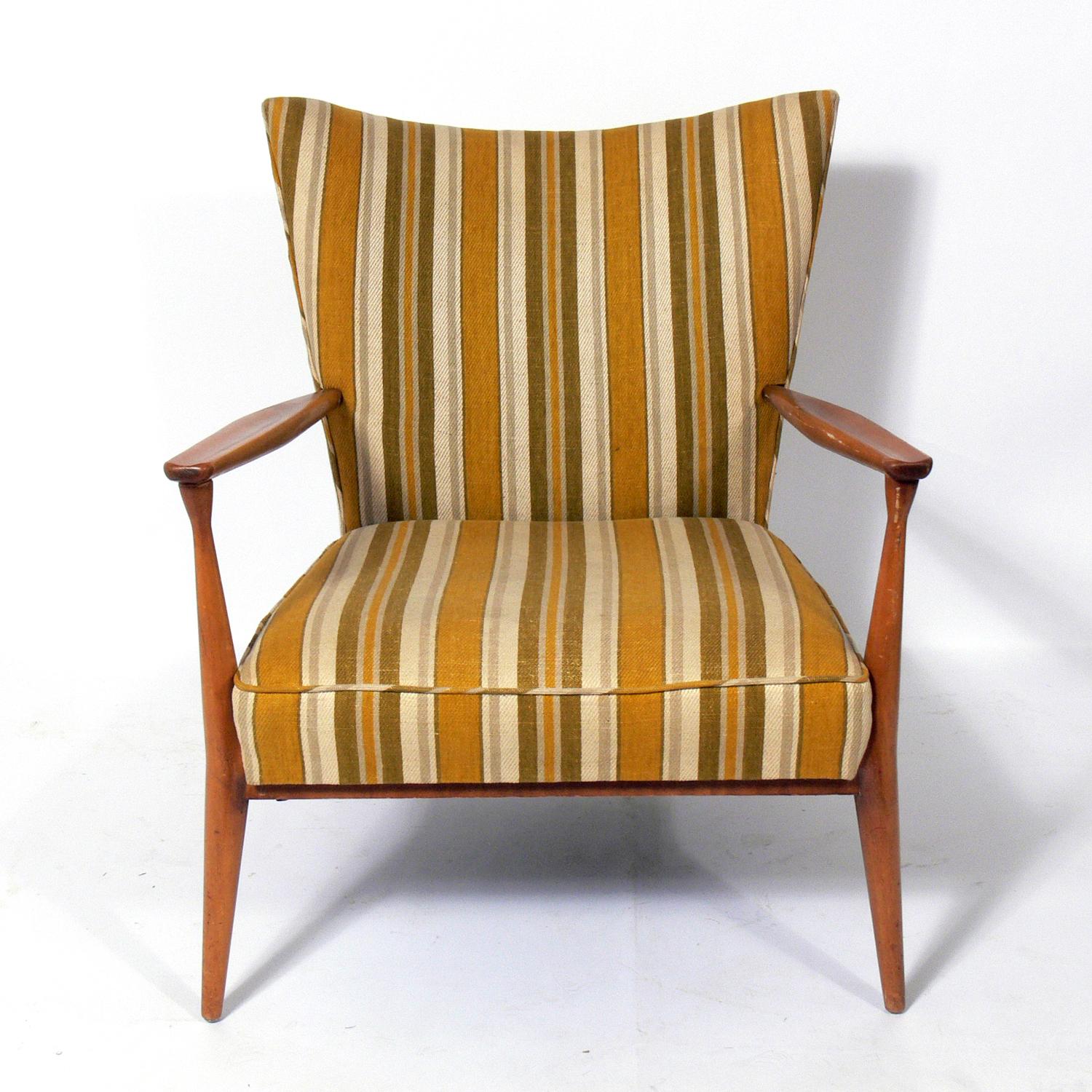 Curvaceous Mid-Century Modern lounge chair, designed by Paul McCobb, circa 1950s. This chair has wonderful lines at every turn and looks great from any angle. Very comfortable. This piece is currently being reupholstered and refinished and can be