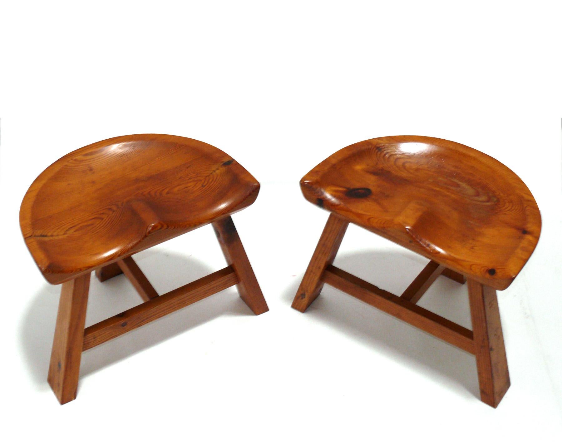 Selection of Curvaceous stools, in the manner of Charlotte Perriand, probably American, circa 1960s. They retain their warm original patina. They are priced at $850 each or $1500 for the pair.