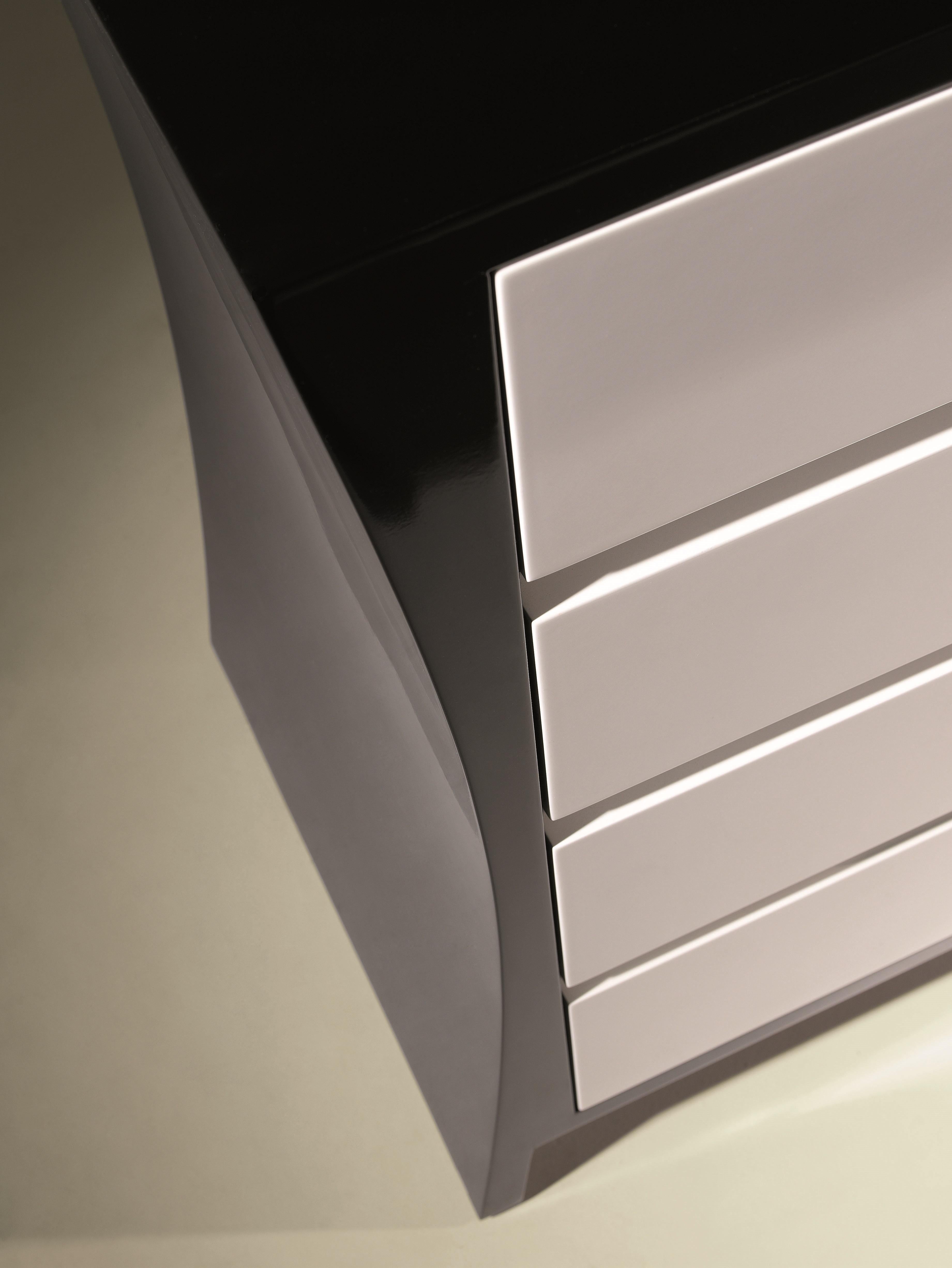 Chest of drawers in lacquer black and white.

Bespoke / Customizable
Identical shapes with different sizes and finishings.
All RAL colors available. (Mate / Half Gloss / Gloss).