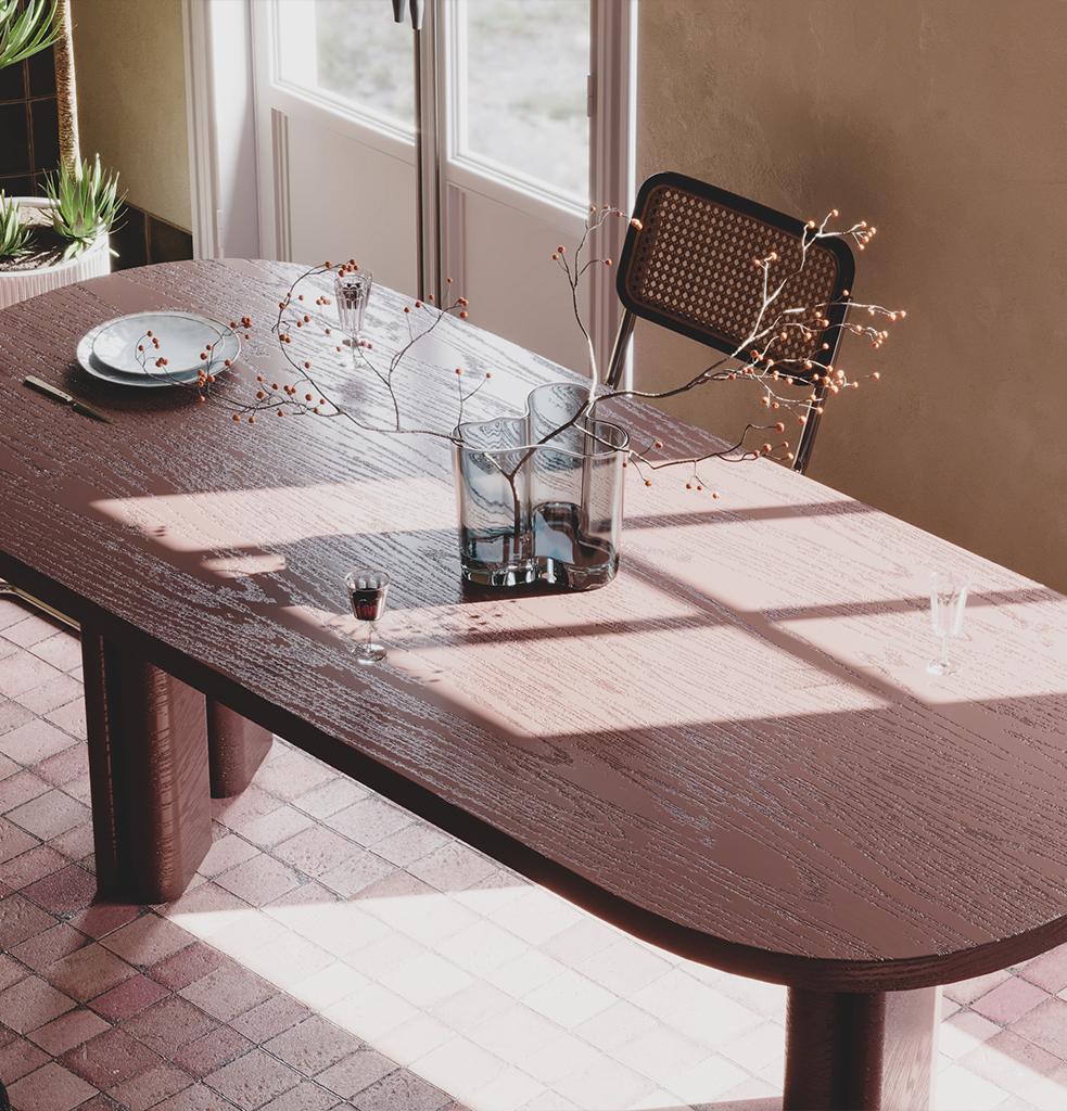 Curve dining table is modern and innovative with its minimal lines and simple geometric form. The legs, which are perpendicular to the table top, constitute the identity of the Curve table. 