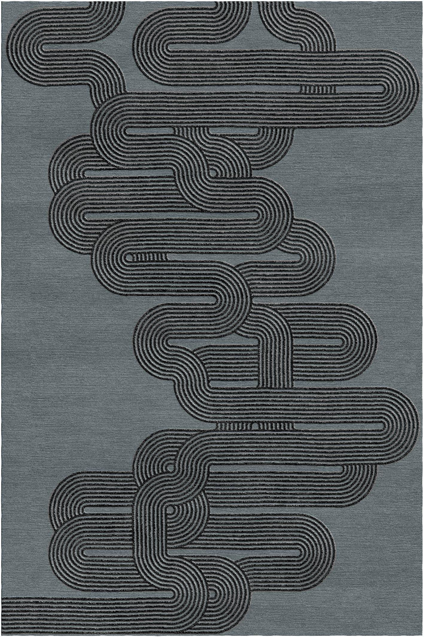 Curve rug II by Giulio Brambilla
Dimensions: D 300 x W 200 x H 1.5 cm
Materials: NZ wool, bamboo silk
Available in other colors.

A striking design of strong visual impact by artist and architect Giulio Brambilla, this rug will make a statement