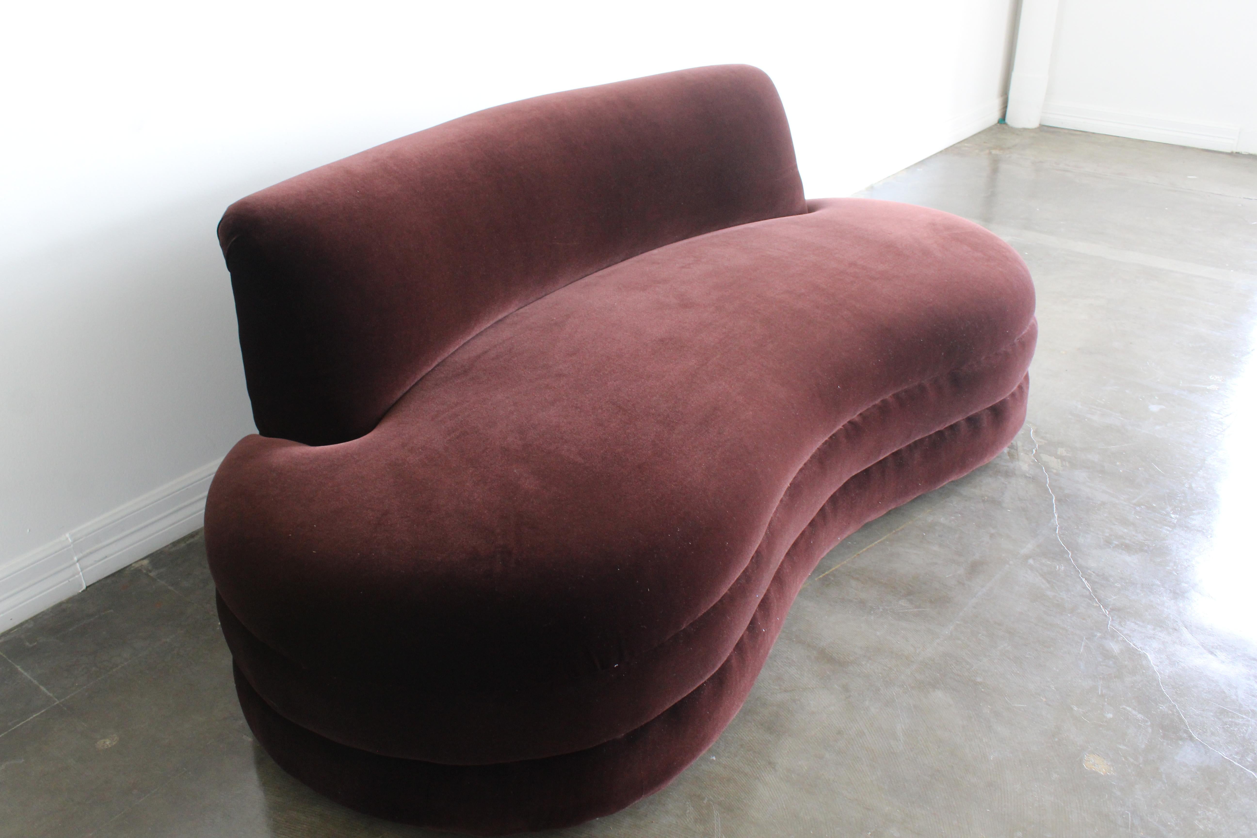 armless velvet sofa