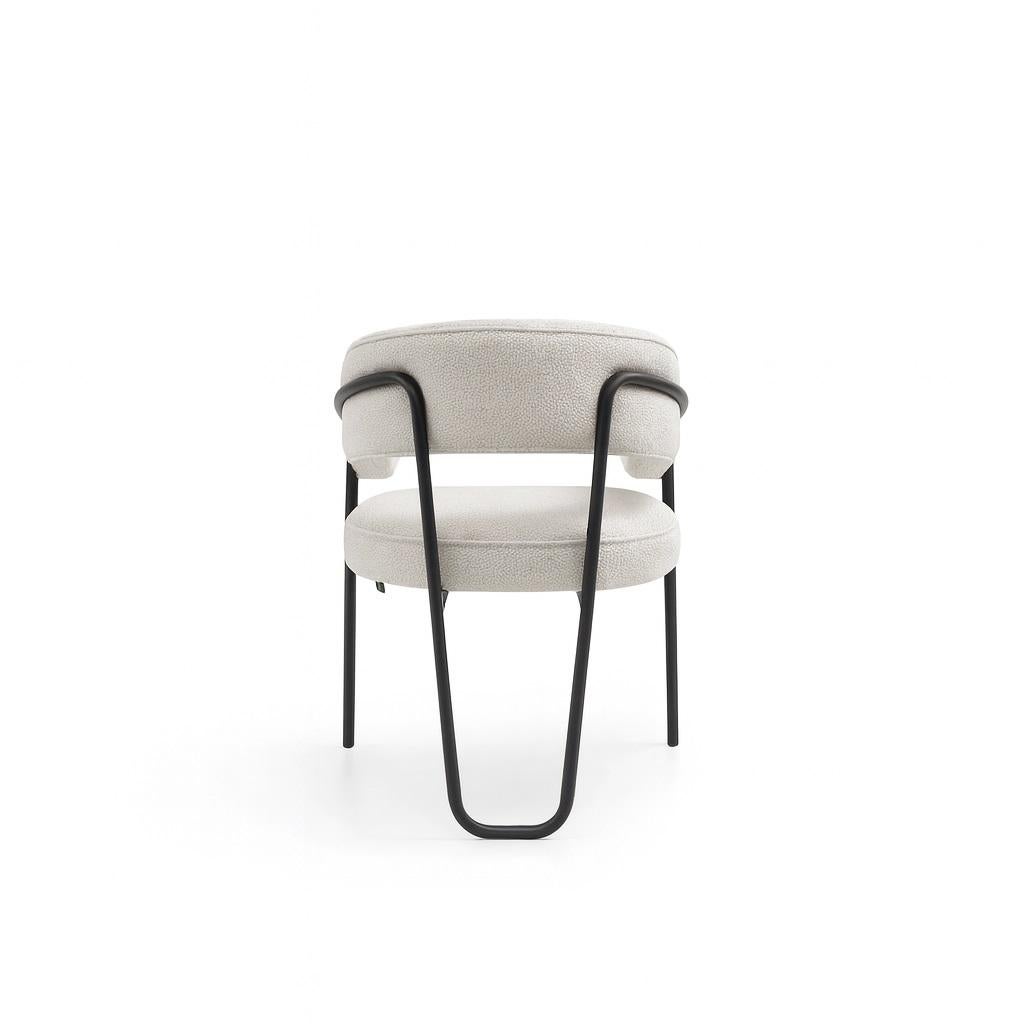 Sillón de Respaldo Curvo con Elegante Estructura Metálica y Tapizado Bouclé-Sergio López Español en venta