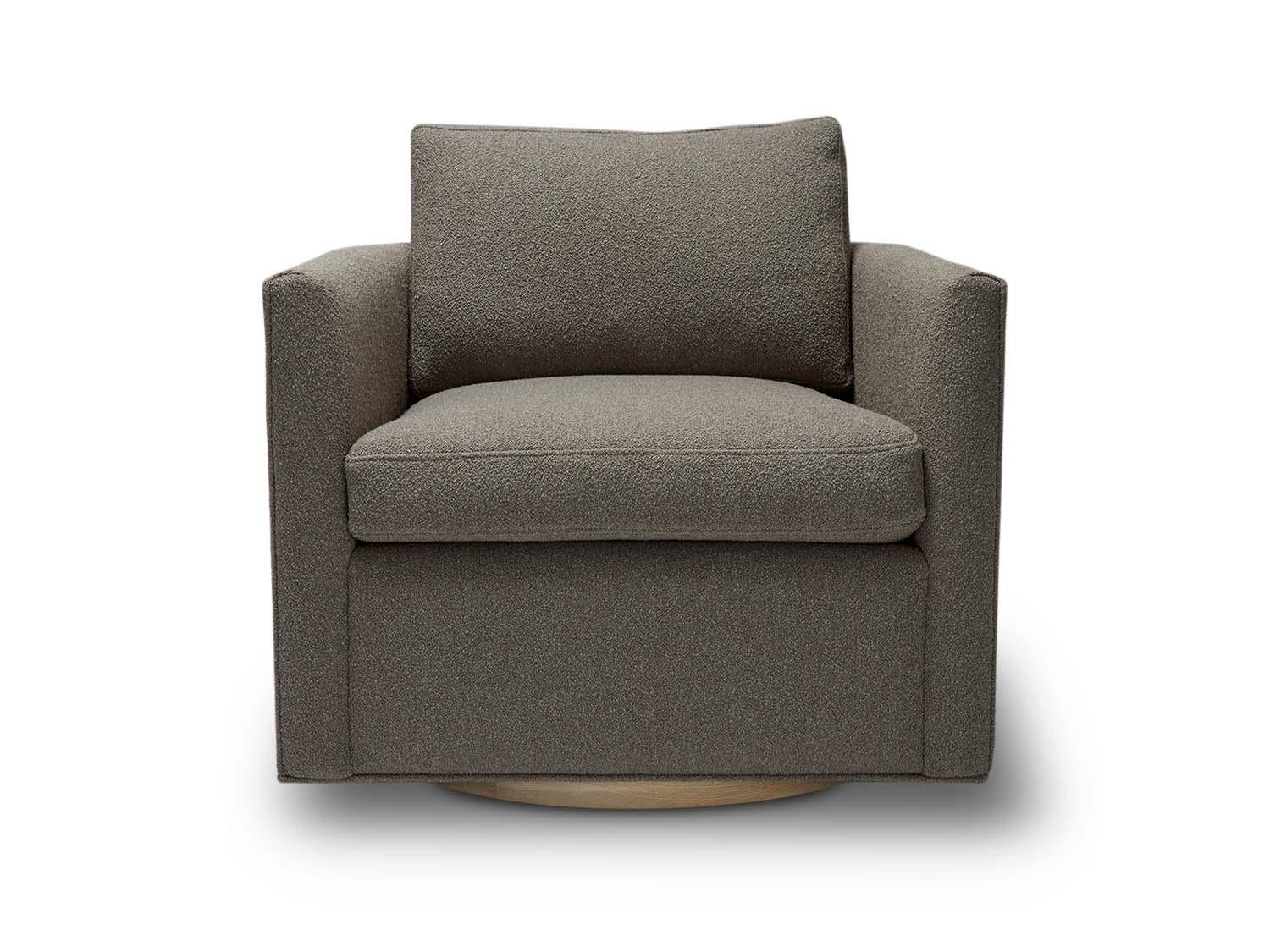 The curved back swivel chair is a tuxedo style lounge chair with curved corners and a metal base. The chair features down-wrapped, removable seat and back cushions.

The Lawson-Fenning Collection is designed and handmade in Los Angeles,