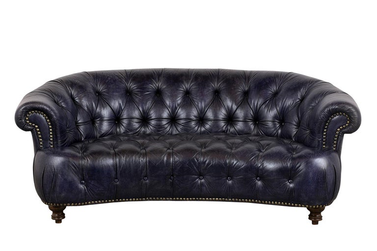curved tufted leather sofa