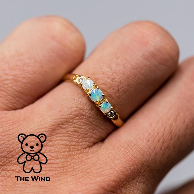 Curved Band Australian Solid Round Opal Diamond Band 14K Yellow Gold.

Free Domestic USPS First Class Shipping!  Free One Year Limited Warranty!  Free Gift Bag or Box with every order!



Opal—the queen of gemstones, is one of the most beautiful and