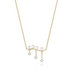 Collana in oro giallo 14K con perle e diamanti a barre curve