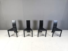 Curved black wooden dinng chairs, 1980s