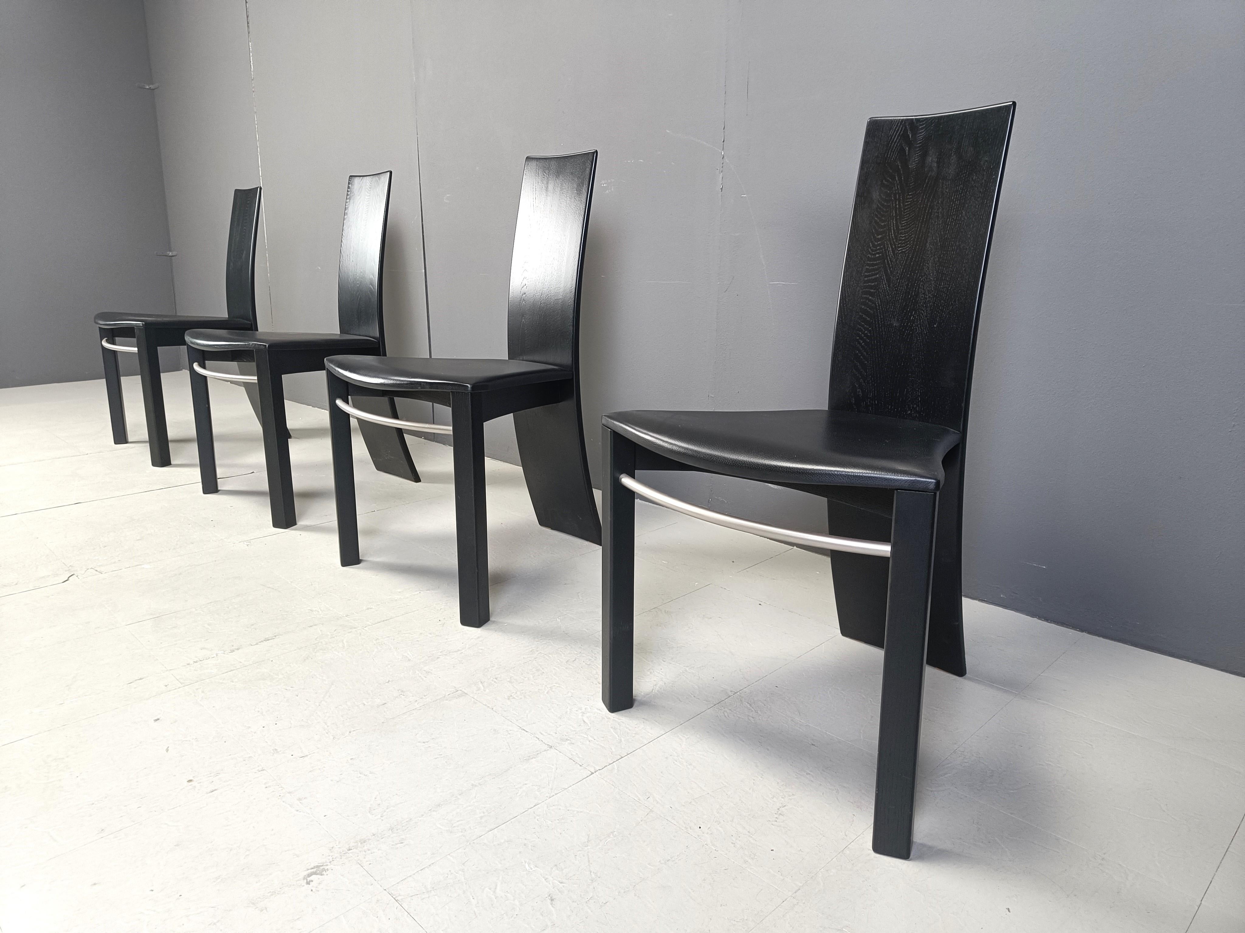 Late 20th Century Curved black wooden dinng chairs, 1980s For Sale