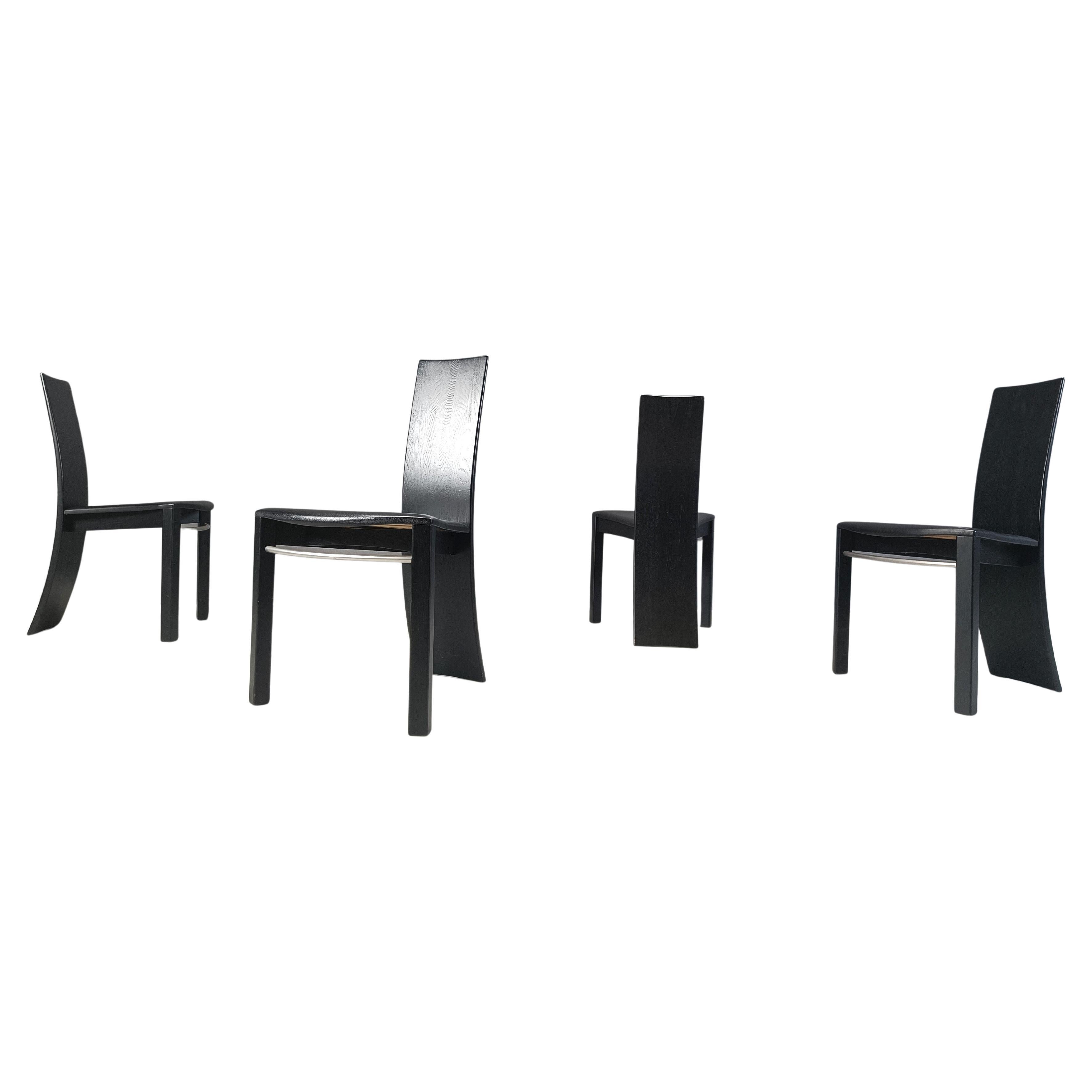 Curved black wooden dinng chairs, 1980s For Sale