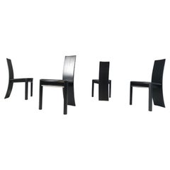 Curved black wooden dinng chairs, 1980s