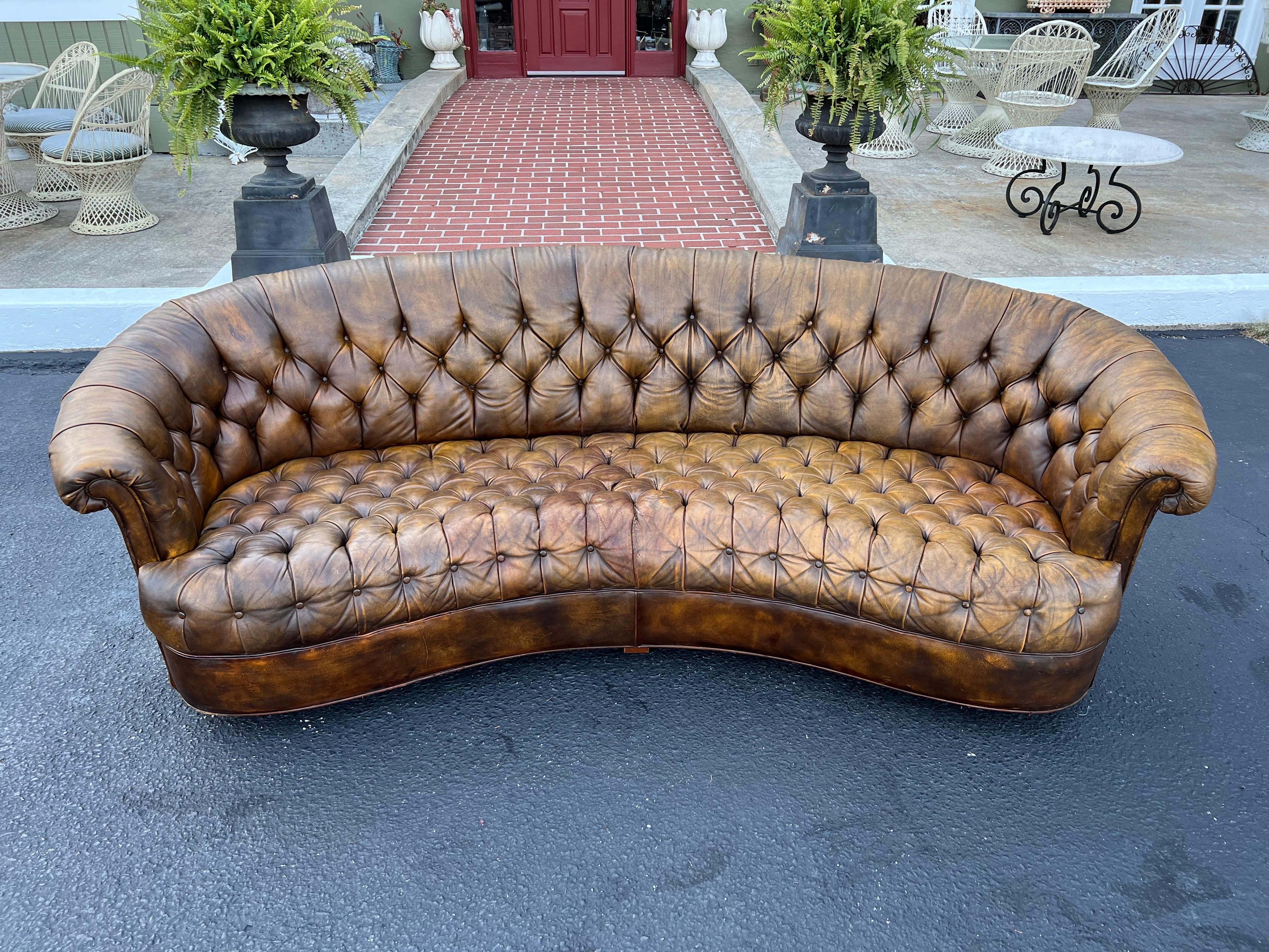 brown leather curved sofa