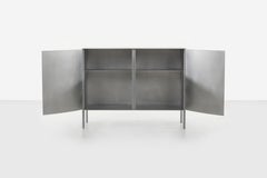 Curved Cabinet by Jonathan Nesci in Rolled and Machined Waxed Aluminum