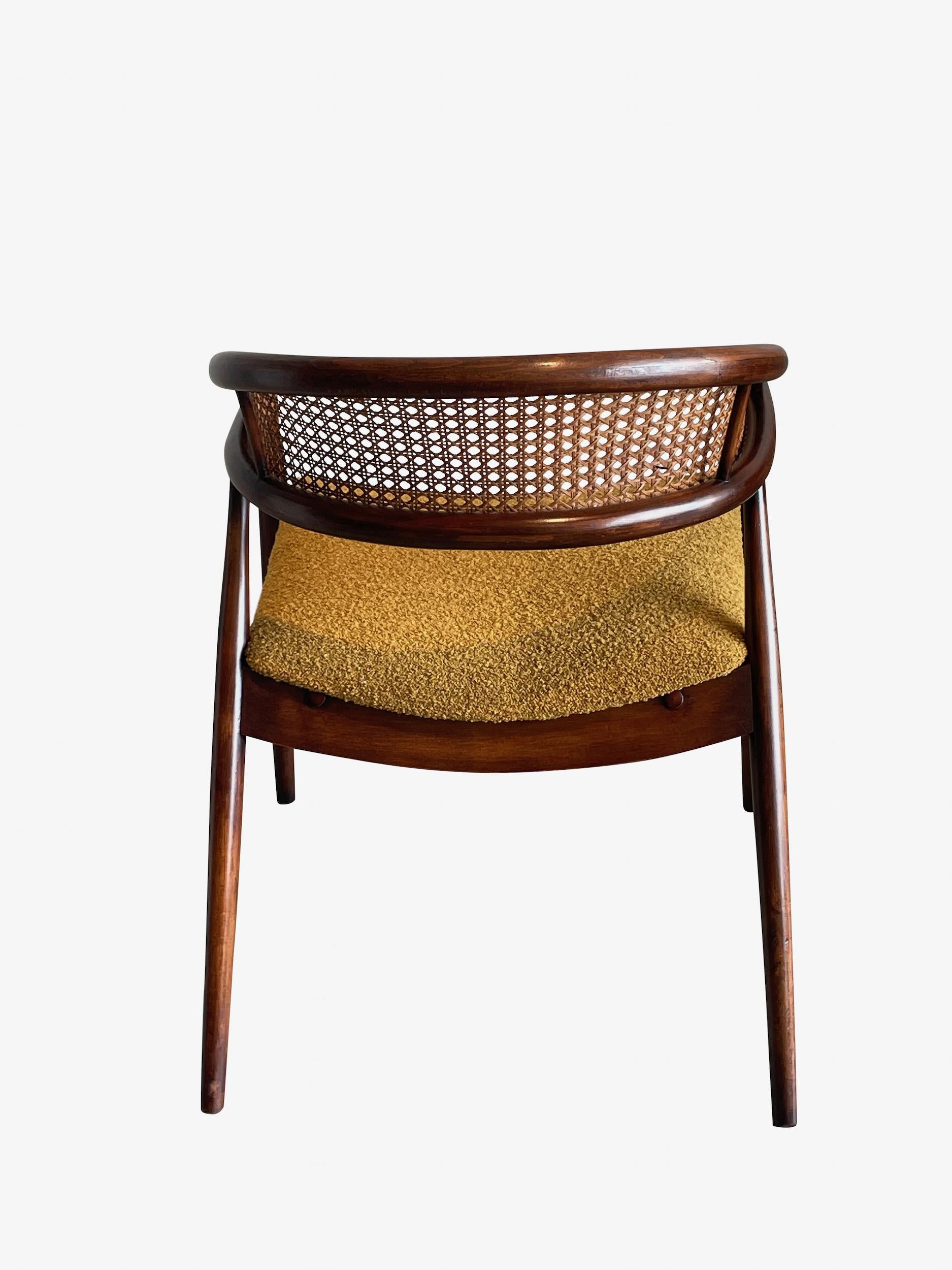 Mid Century Spanish pair of curved cane back chairs.
Beechwood.
Newly reupholstered in boucle fabric.

