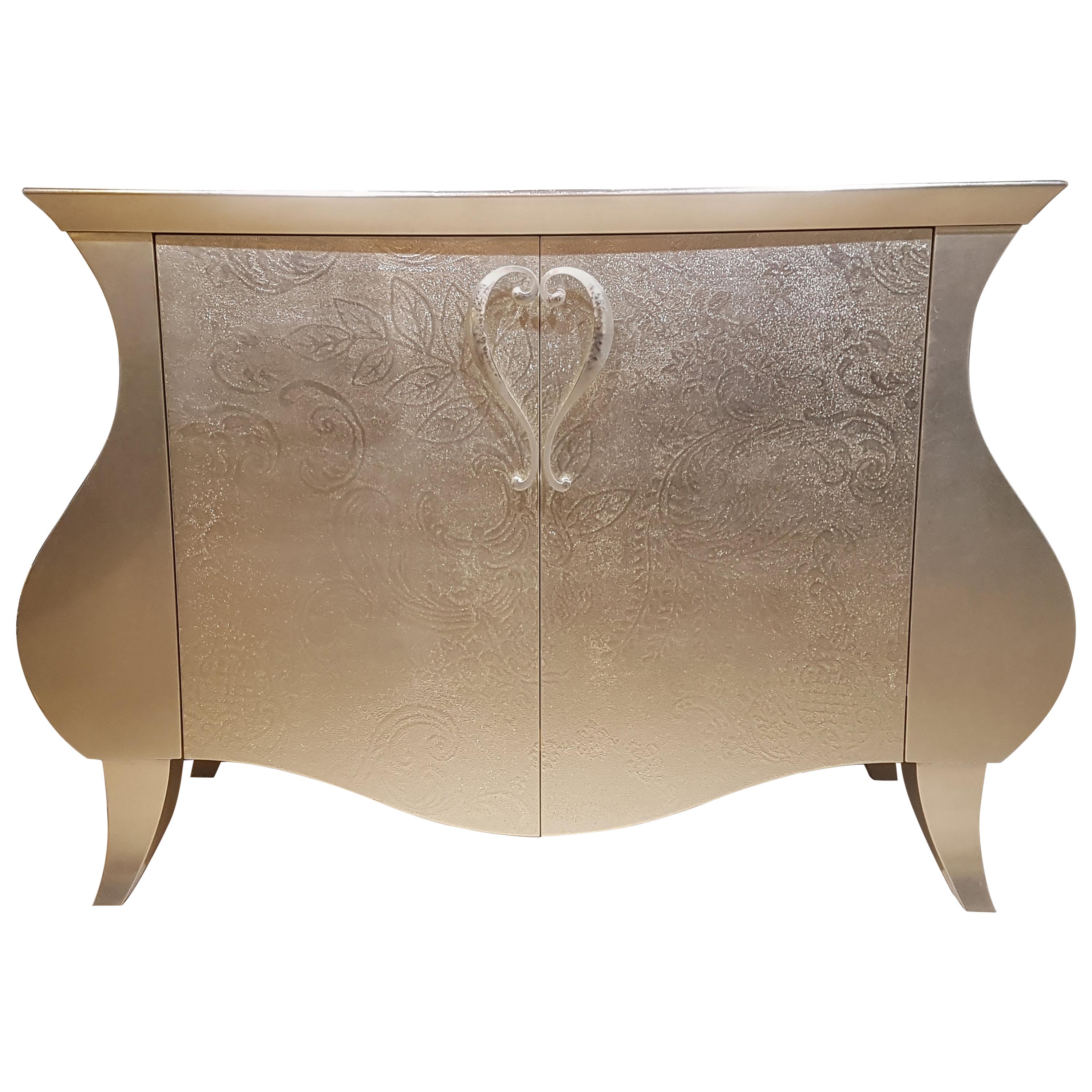 Curved Commode with a Floral Gold Leaf Finish For Sale