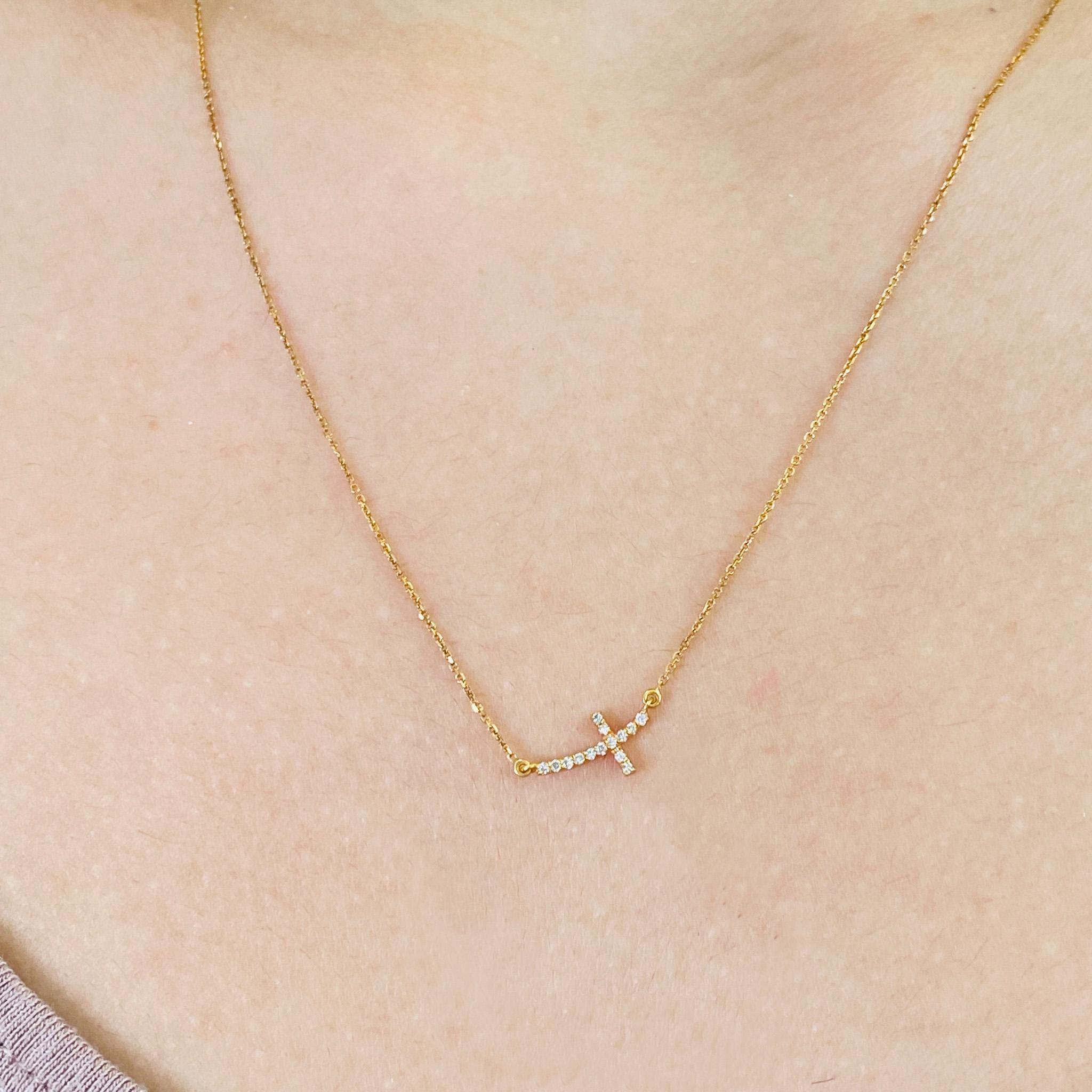 Add a dainty diamond cross in rose gold to the neck of a loved one celebrating an important milestone, like first communion or a quinceñera! This beautiful curved cross pendant will flatter your favorite person! The necklace has an adorable open