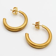 Curved Curves Hoop Circle Earrings in Gold Vermeil and Silver by Sheng Zhang