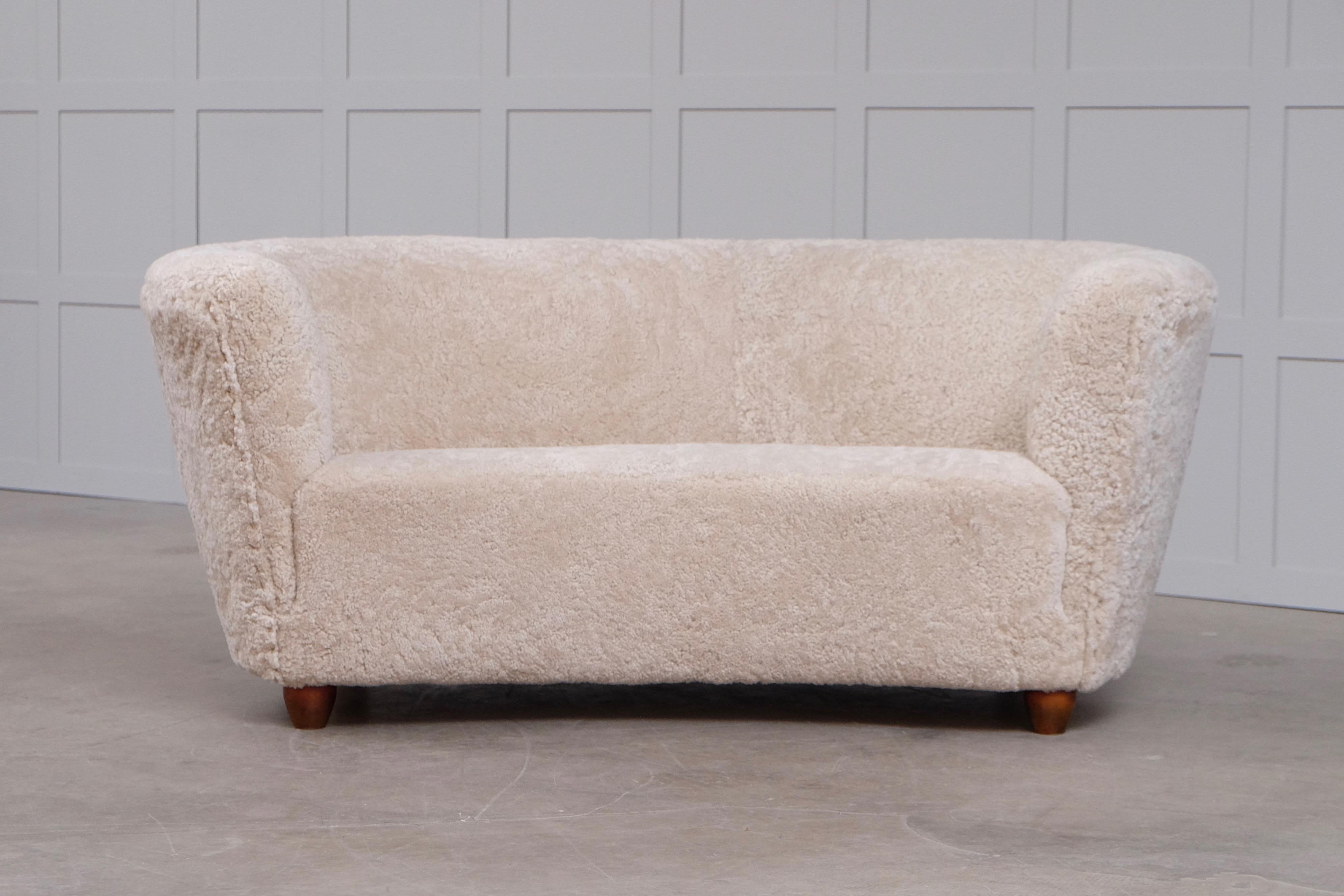 Curved Danish Sheepskin Sofa, 1940s In Good Condition For Sale In Stockholm, SE