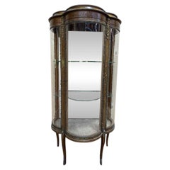Curved display cabinet in Louis XV style in painted wood and bronze