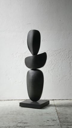 Curved Elegance Still Stand No19: Standing Black Wooden Totem by Joel Escalona