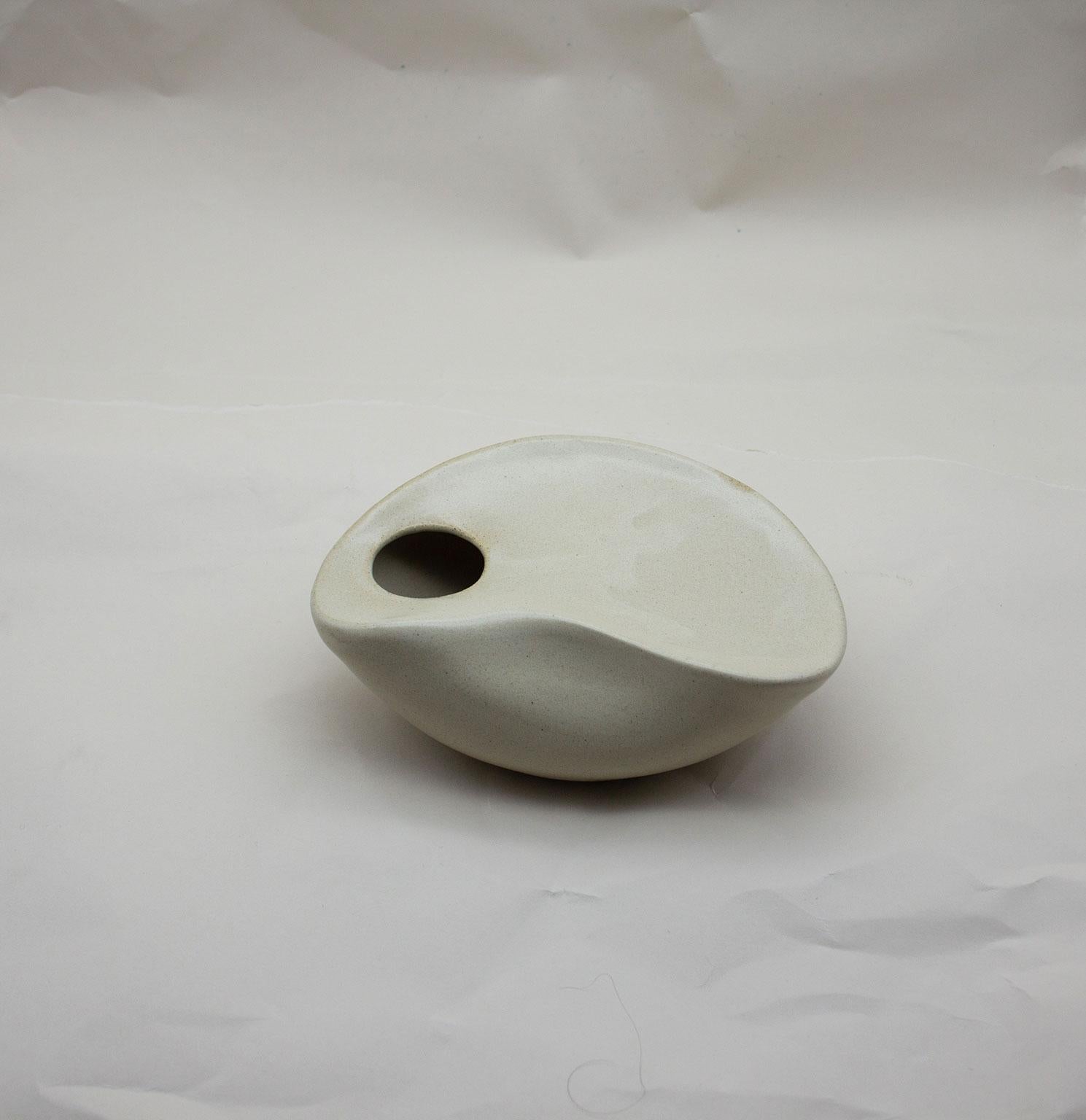 Modern Curved Form Handcrafted Stoneware Sculpture in Antique Cream Glaze For Sale