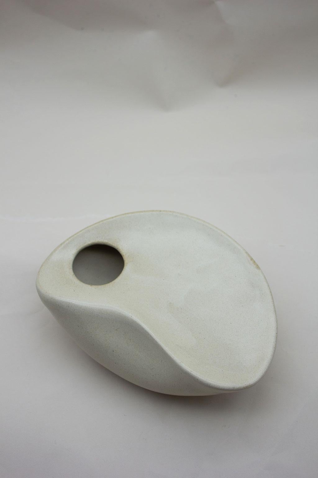 Hand-Crafted Curved Form Handcrafted Stoneware Sculpture in Antique Cream Glaze For Sale