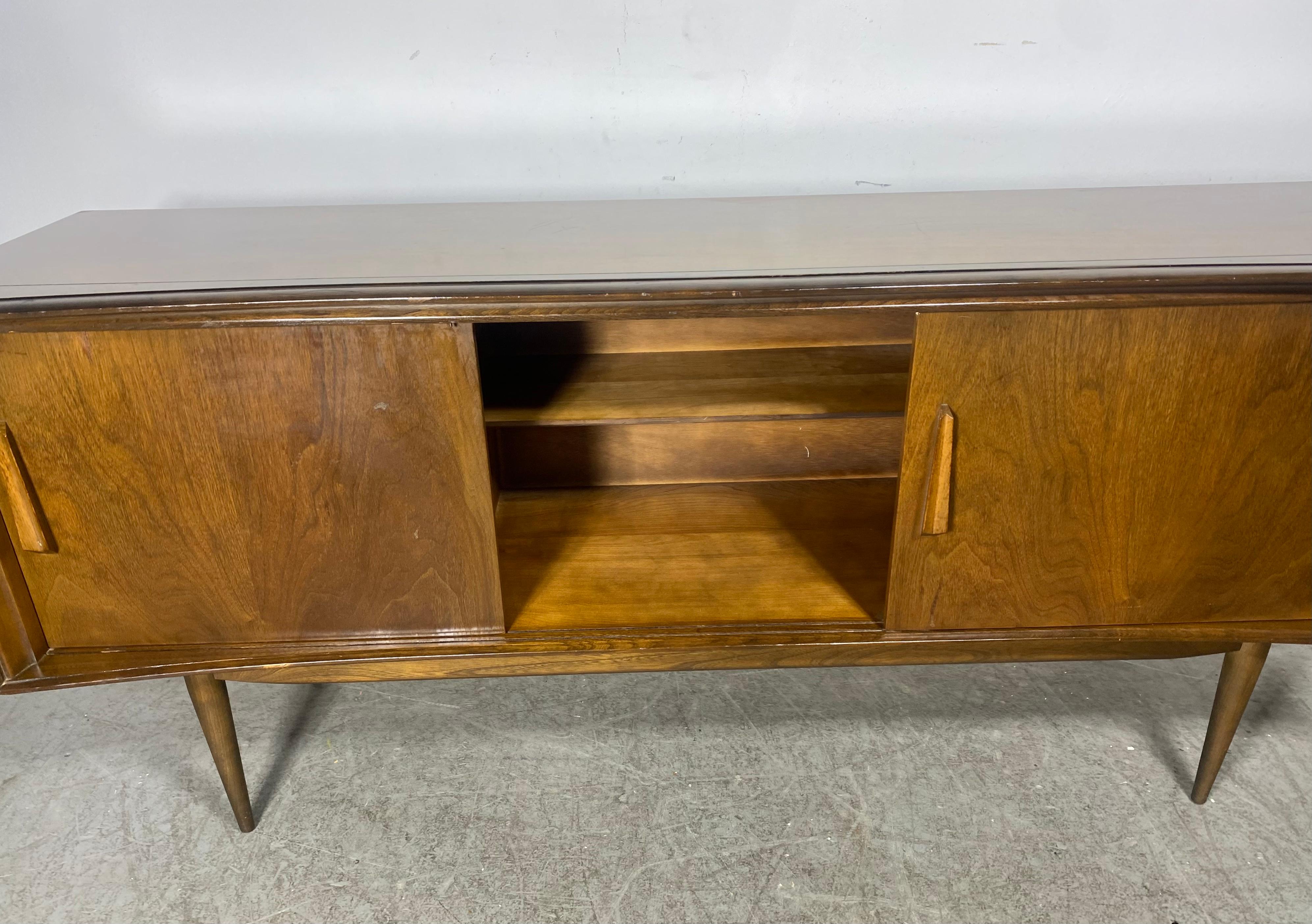 Canadian Curved front Walnut Credenza by Deilcraft. 1950’s,  Classic Modernist Design For Sale