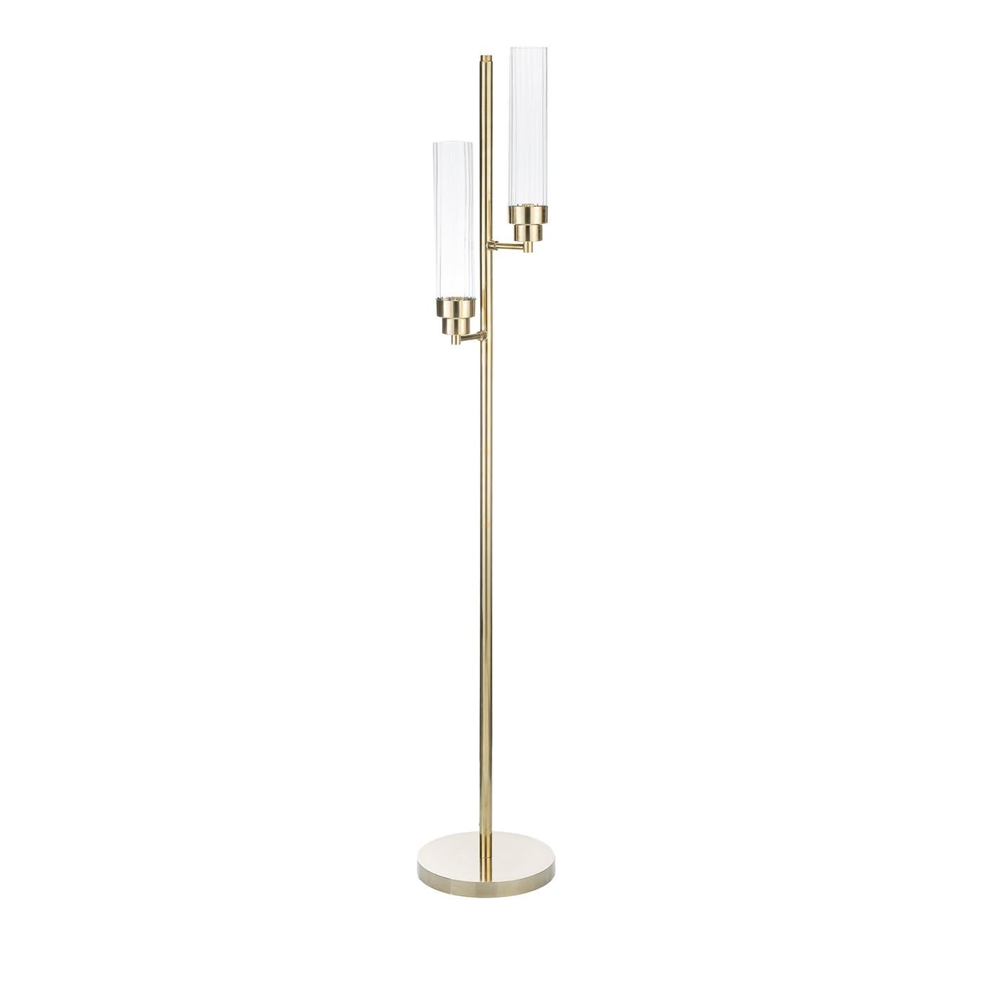 The floor lamp in brass structure and curved glass is a beautiful and functional piece of furniture that can enhance the decor of any room. The lamp's structure is made of high-quality brass, which provides durability and an elegant appearance.