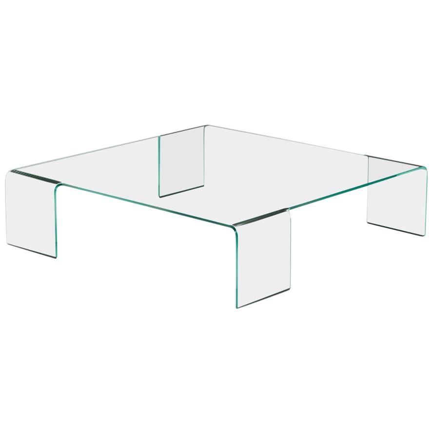Mesa baja de cristal curvado