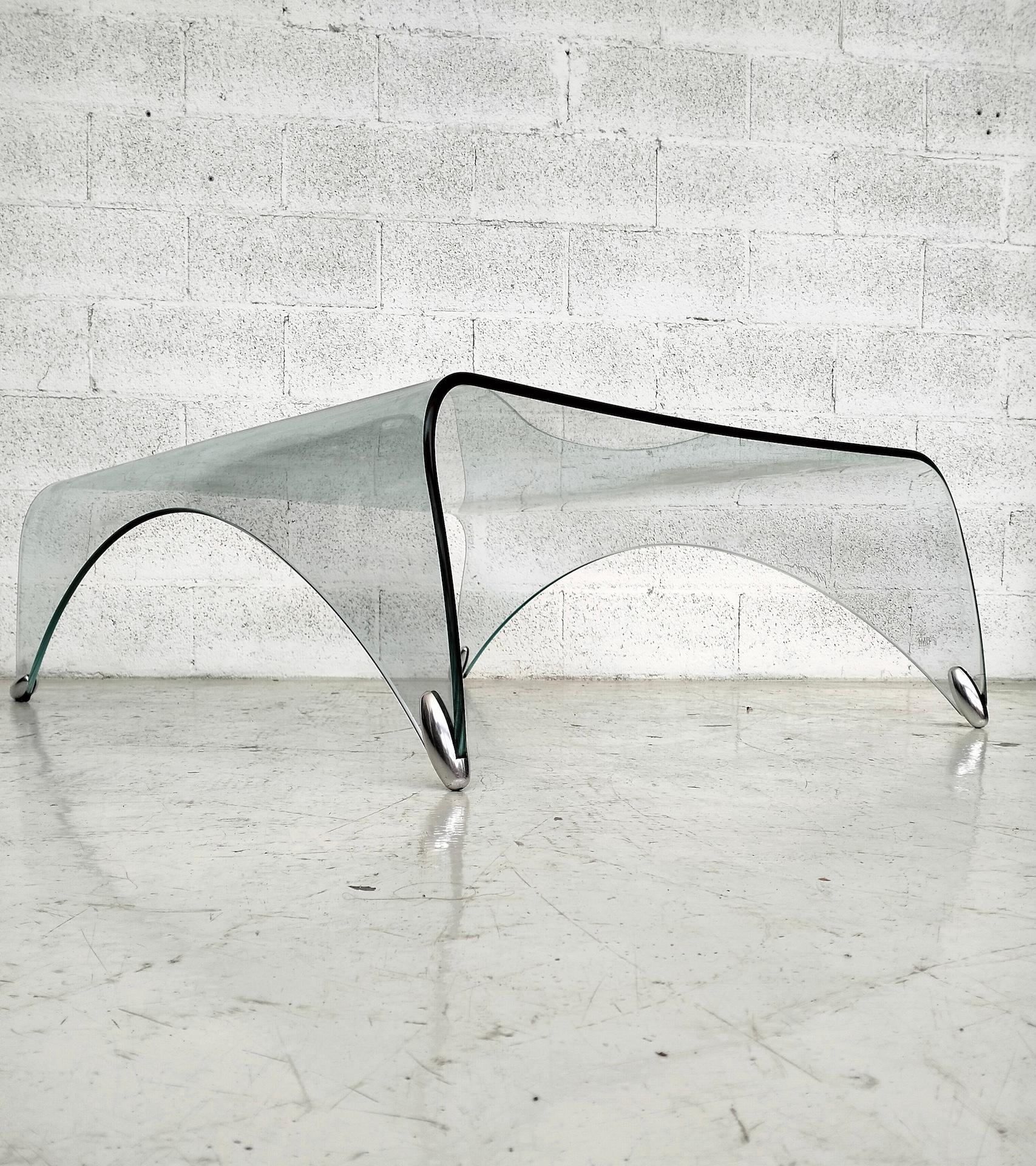 Italian Curved glass coffee table “Genio” by Massimo Iosa Ghini for Fiam  2000s For Sale