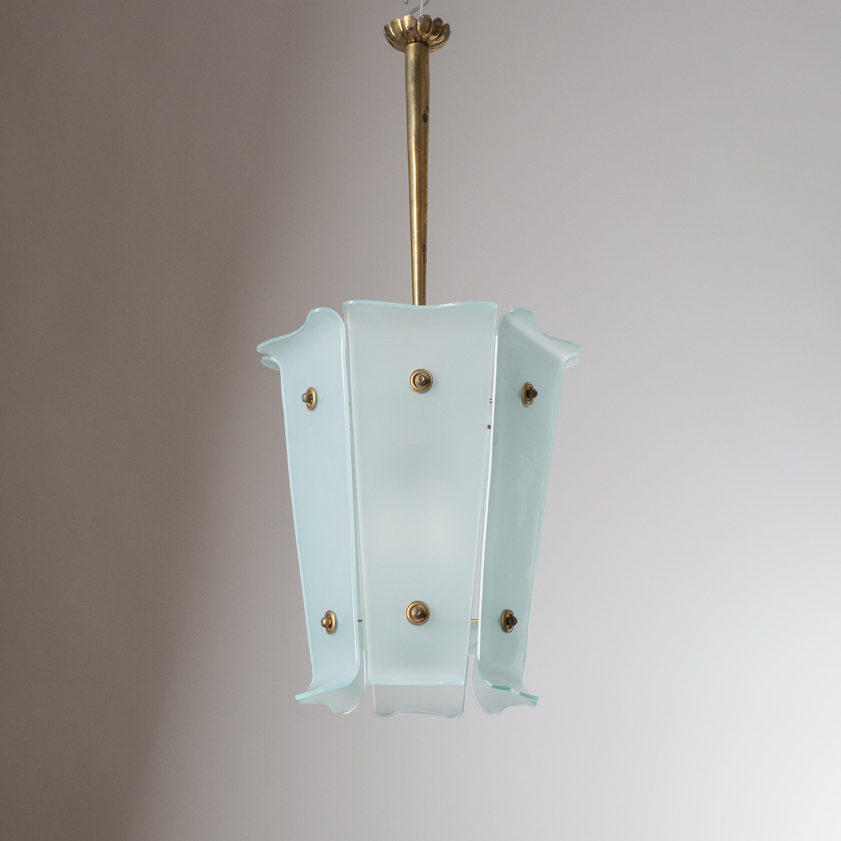 Rare glass lantern designed by Luigi Fontana in the 1930-1940s. Six tapered and curved pale-aquamarine glass panes are arranged around a delicate brass structure. Three original brass E14 sockets with new wiring. Glass height is 13.5inches/34cm.