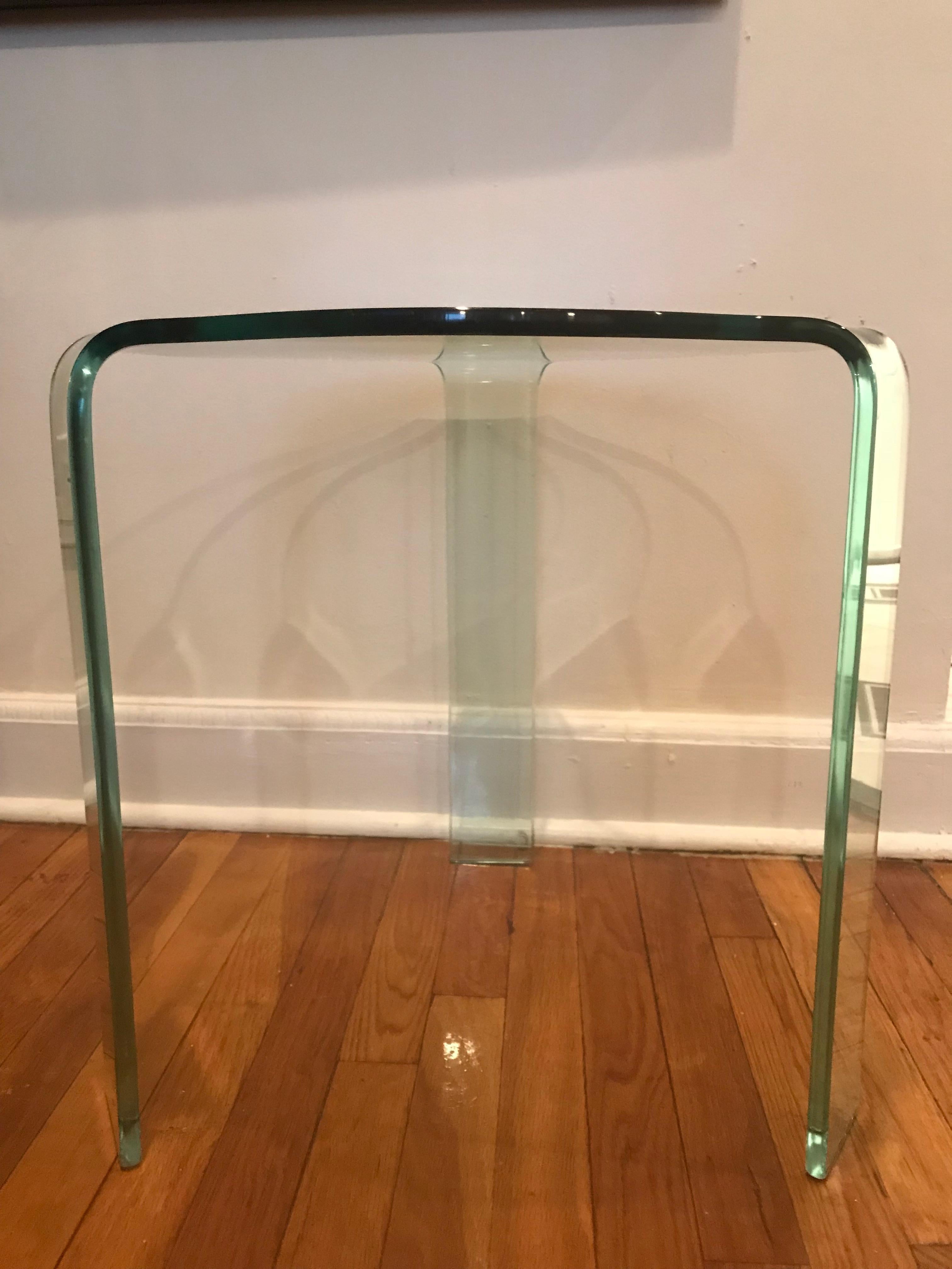 Curved side table, made of glass produced by Fiam, Italia. In perfect condition.