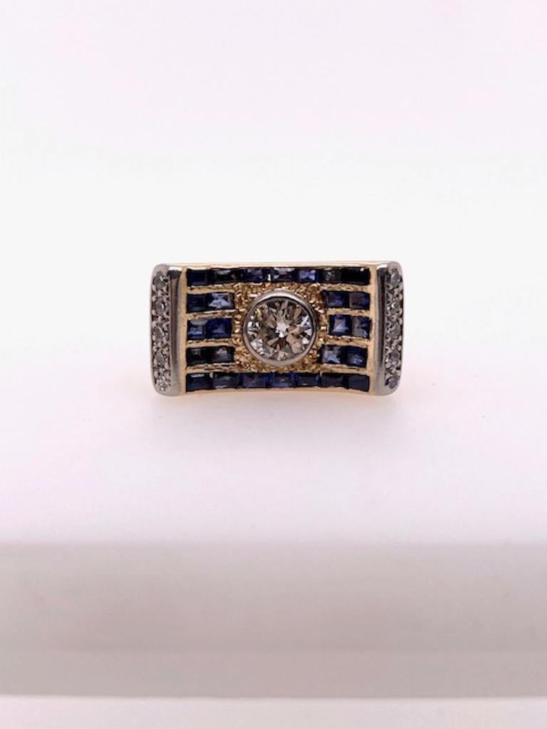 Curved Gold Diamond and Sapphire Ring 1