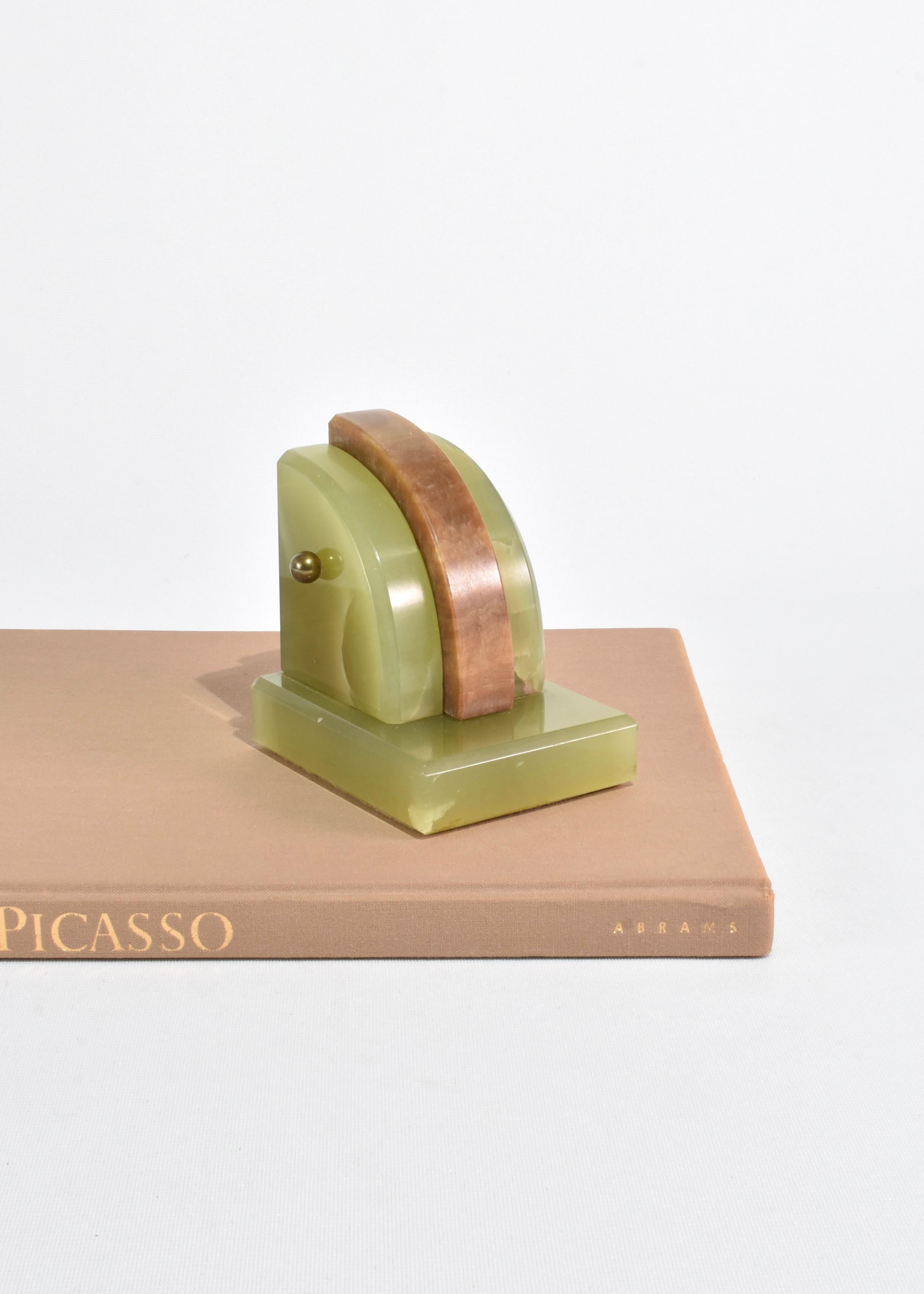 Stunning, curved green onyx bookends with brass knob detail. Set of two, ca. 1930s.