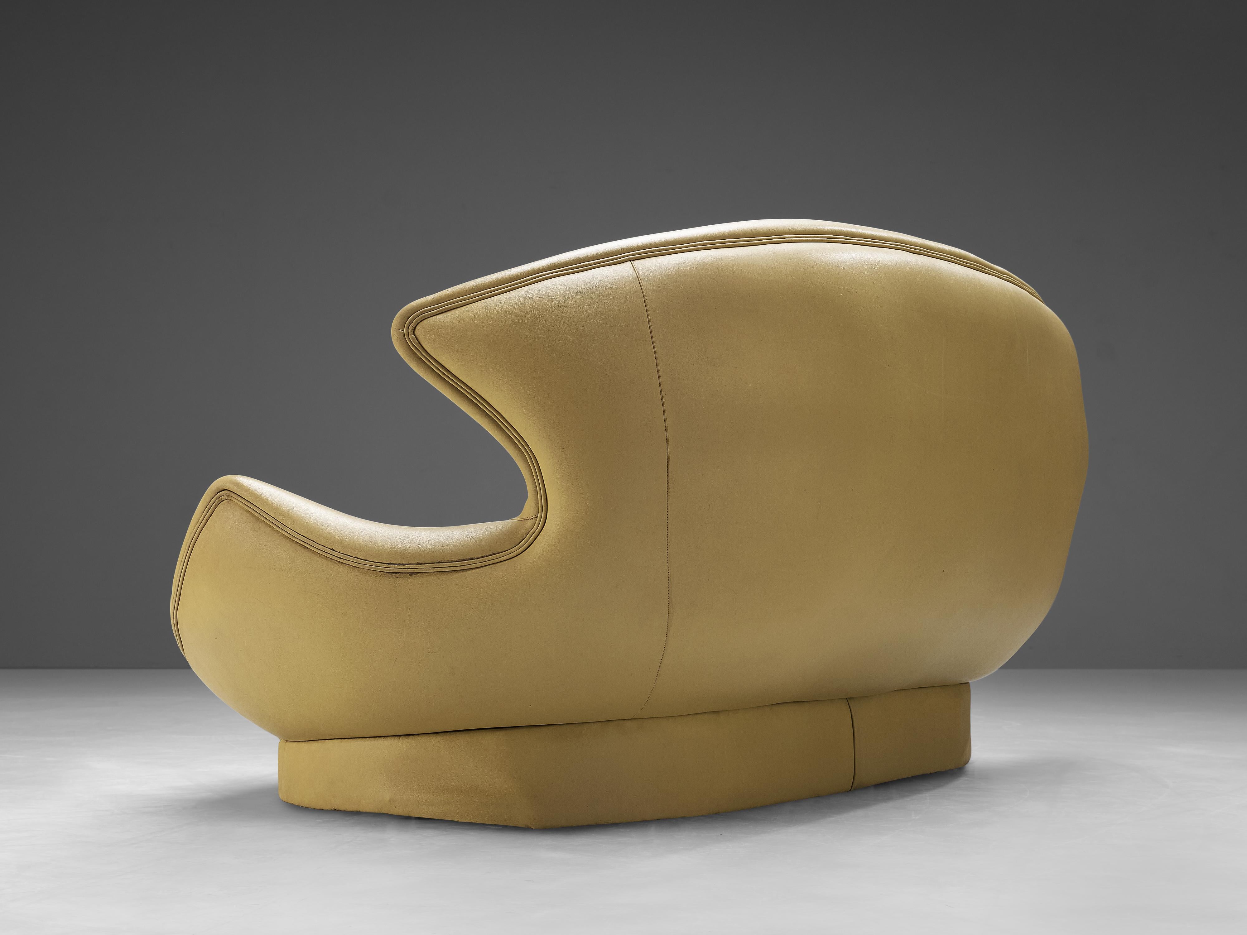 curved yellow sofa