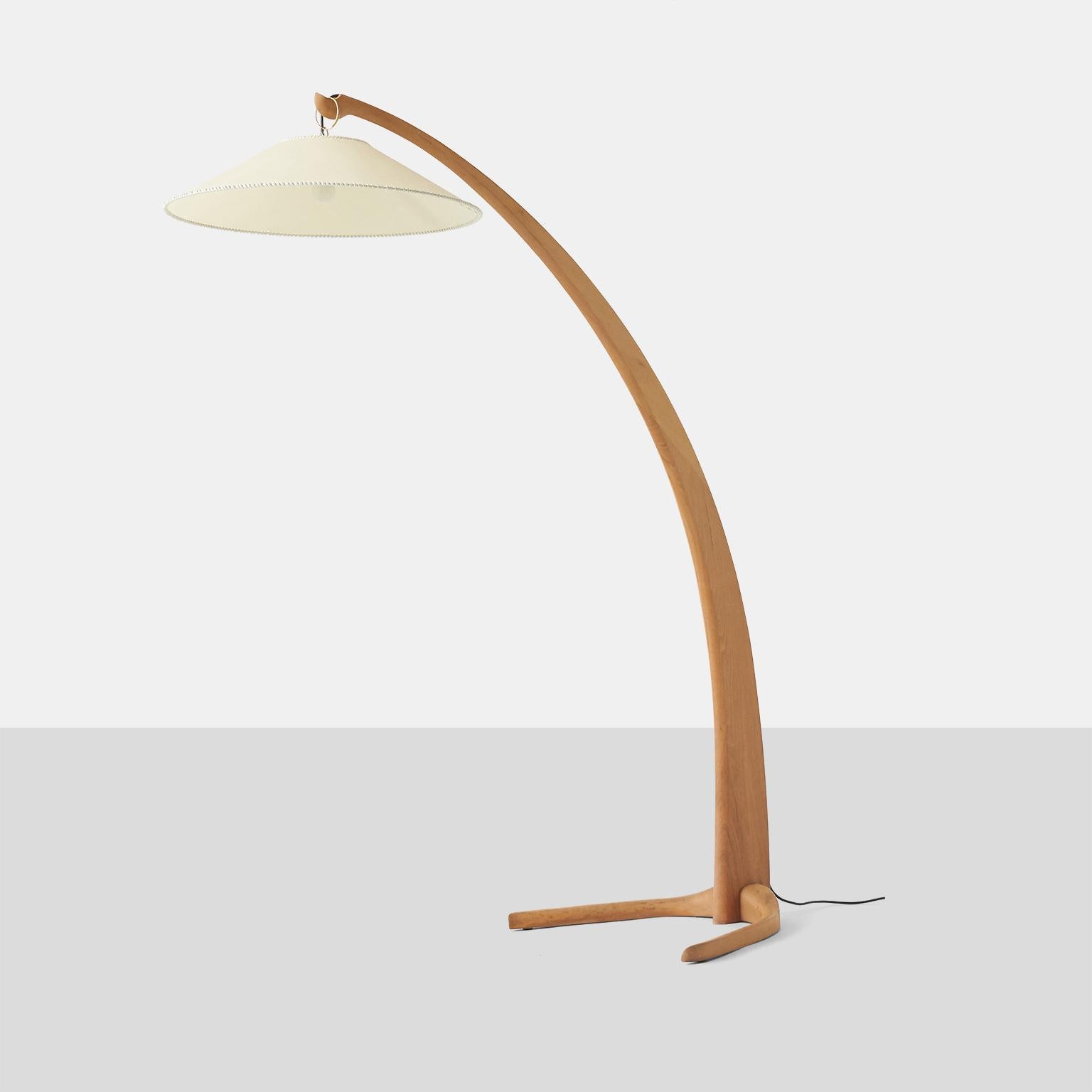 curved wooden floor lamp