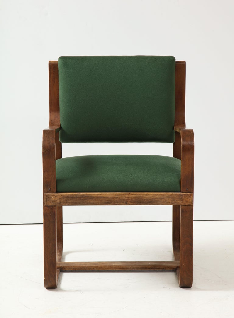 Curved laminated wood armchair by Giuseppe Pagano, Italy, c. 1940s. 

This stunning armchair was originally designed for the Bocconi University of Milano by architect, furniture designer, and longtime editor of the Casabella, Giuseppe Pagano. The
