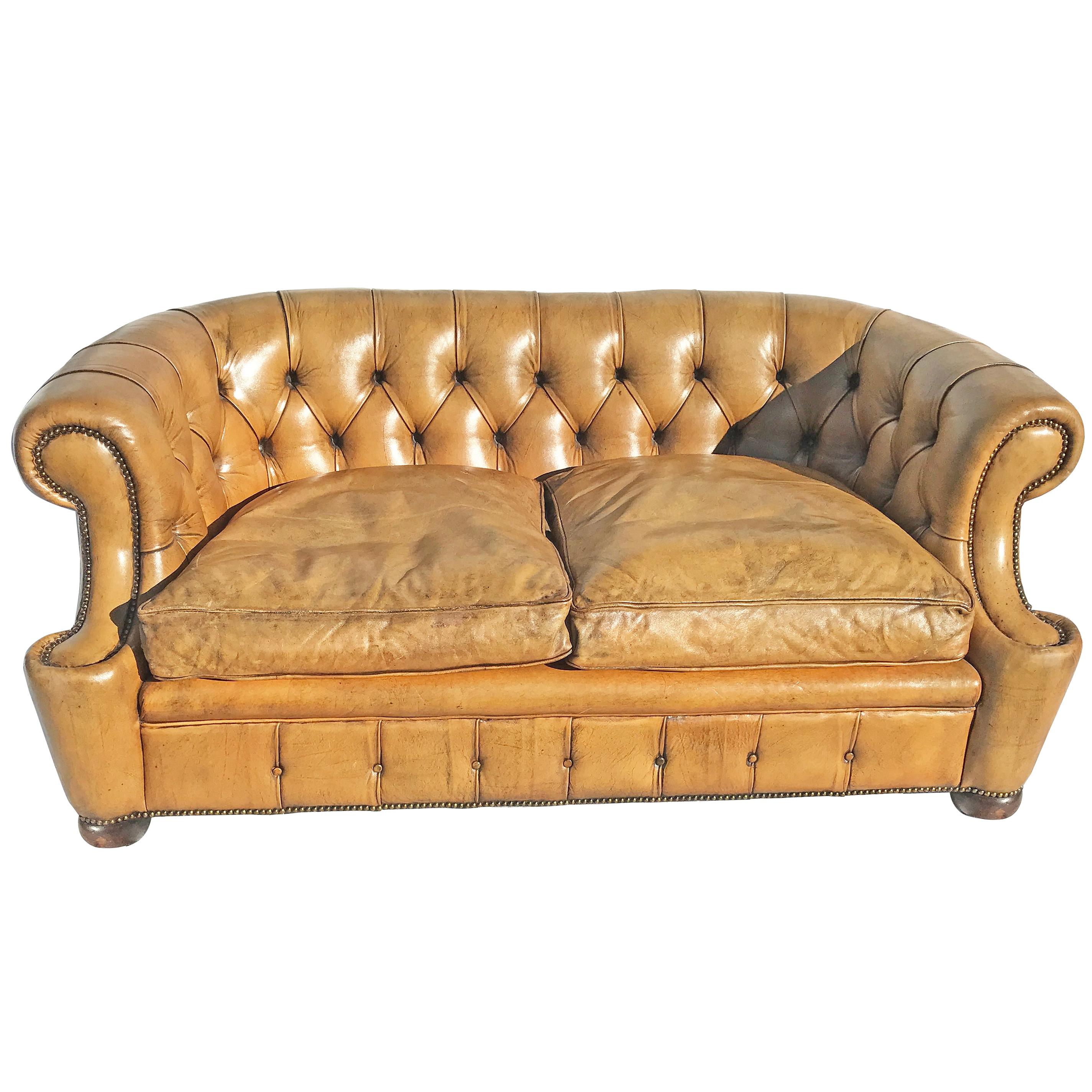 Curved Leather Chesterfield, circa Early 20th Century For Sale