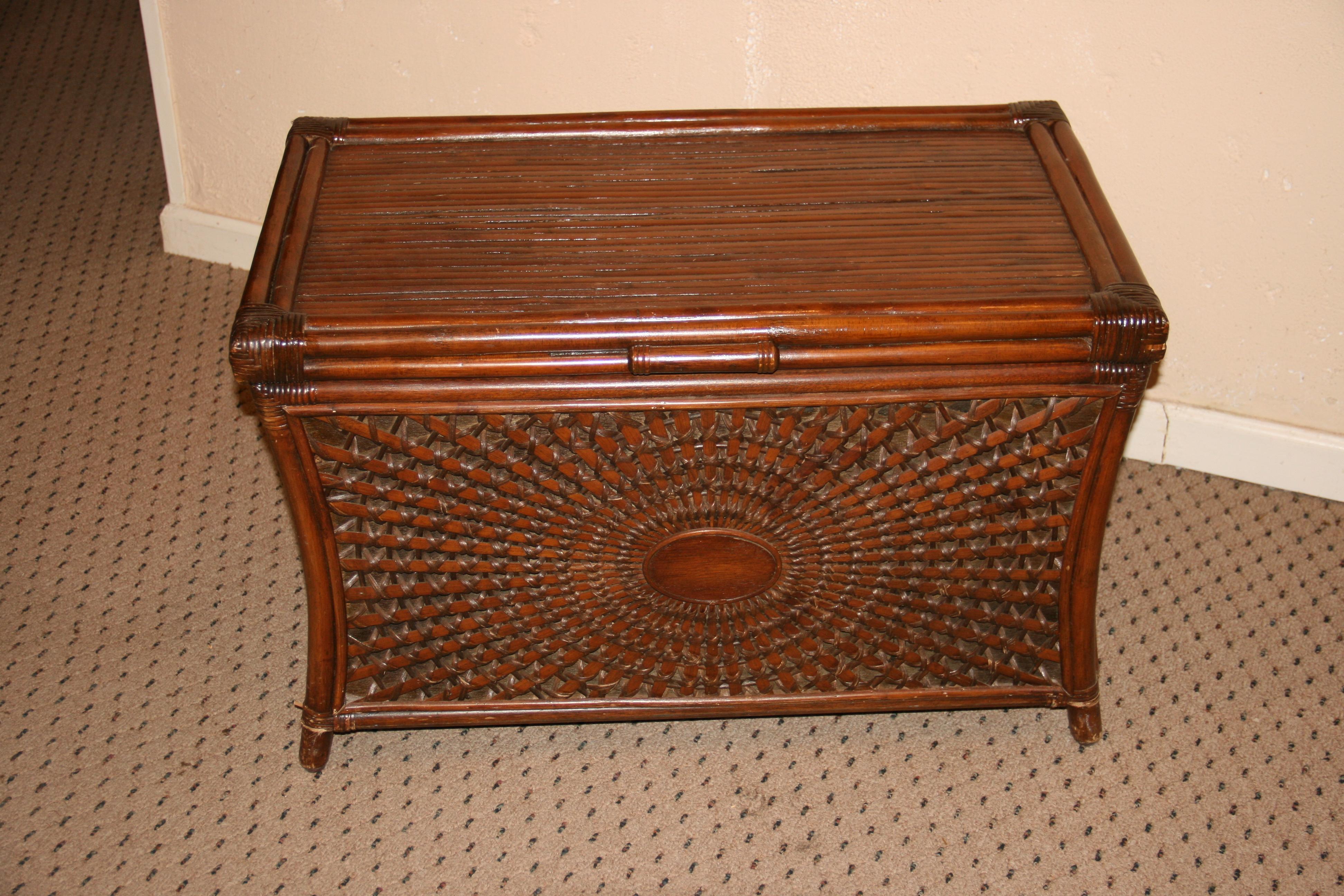 3-1012 Hand crafter wicker and bamboo storage chest.
Curved sides can also be used as a coffee table.